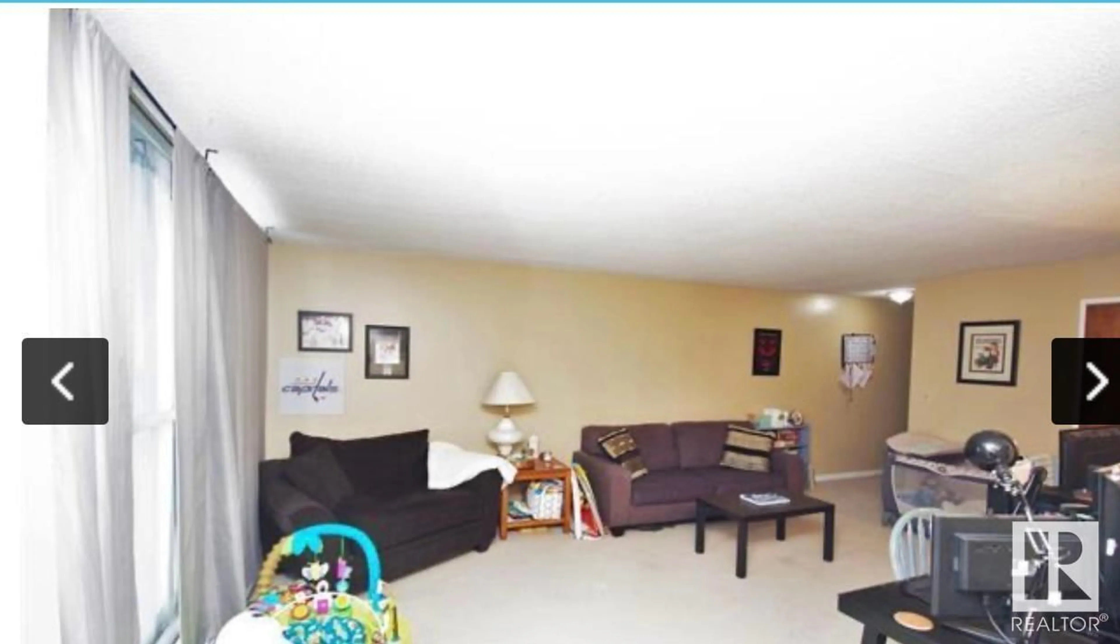 Living room with furniture, unknown for 904 STONY PLAIN RD, Edmonton Alberta T5N3R2