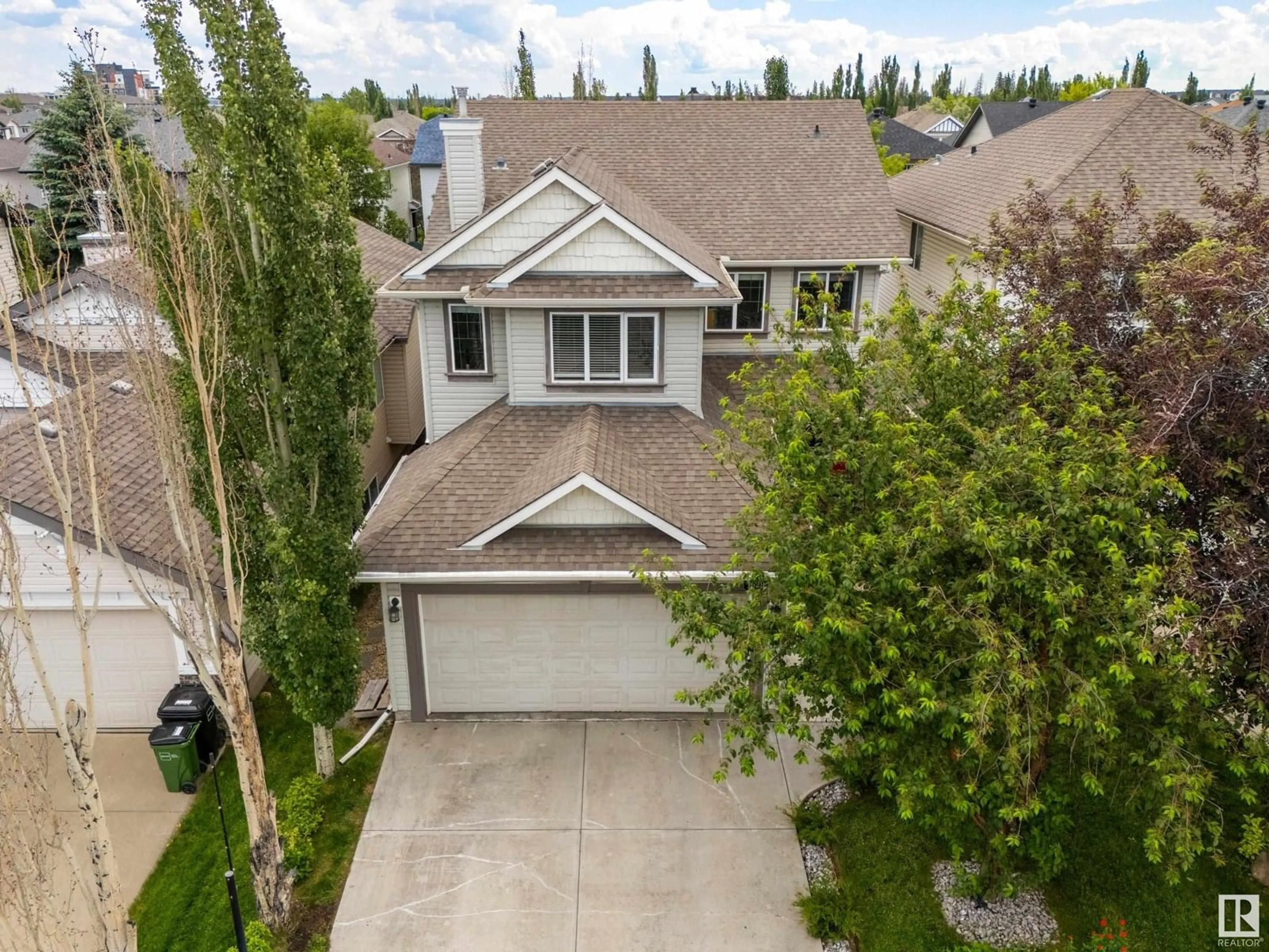 A pic from outside/outdoor area/front of a property/back of a property/a pic from drone, street for 1629 ROBERTSON CL, Edmonton Alberta T6W1K1