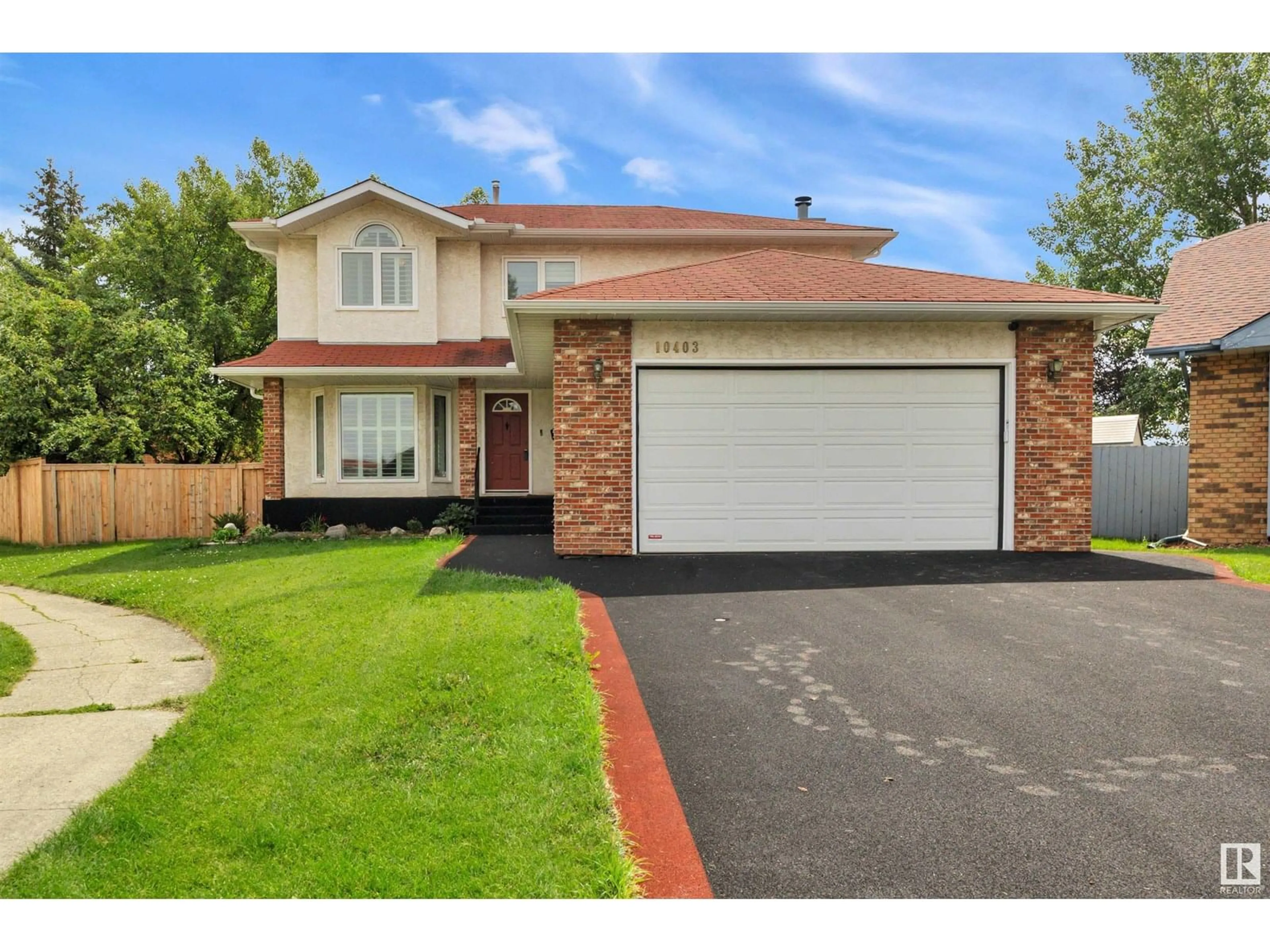 Home with brick exterior material, street for NW - 10403 31 AV, Edmonton Alberta T6J3K2