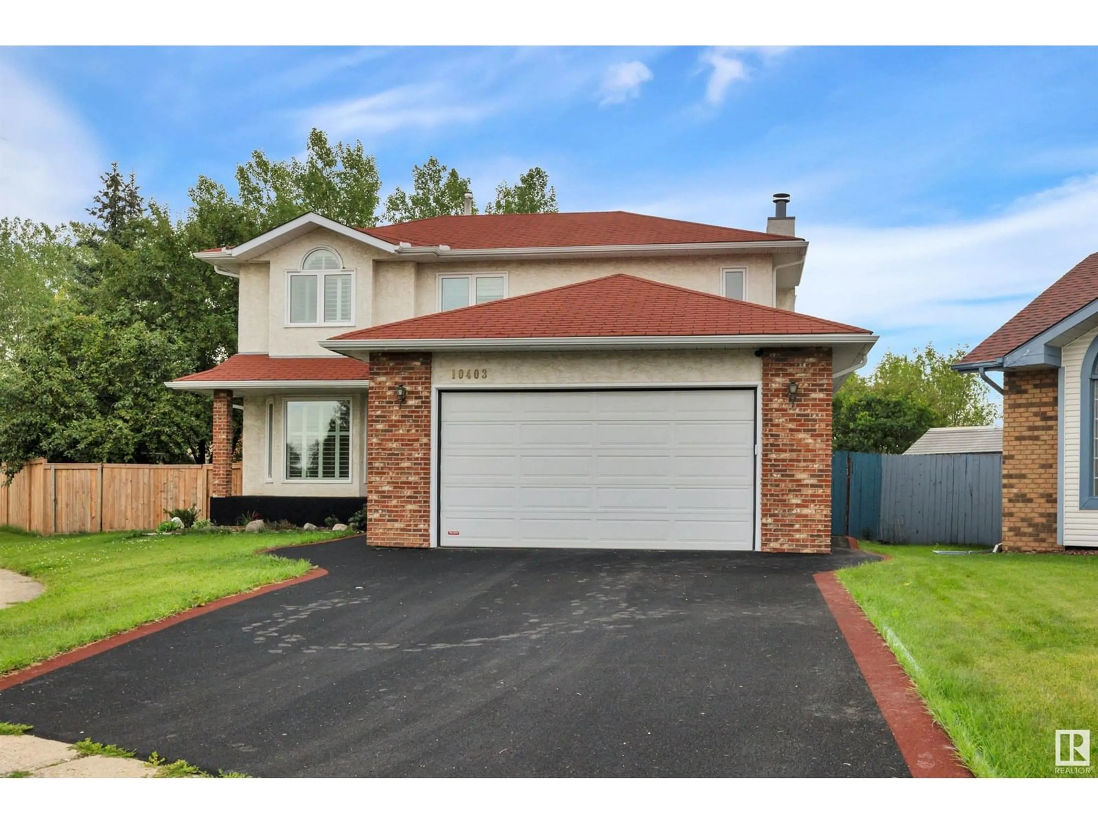 Home with brick exterior material, street for NW - 10403 31 AV, Edmonton Alberta T6J3K2
