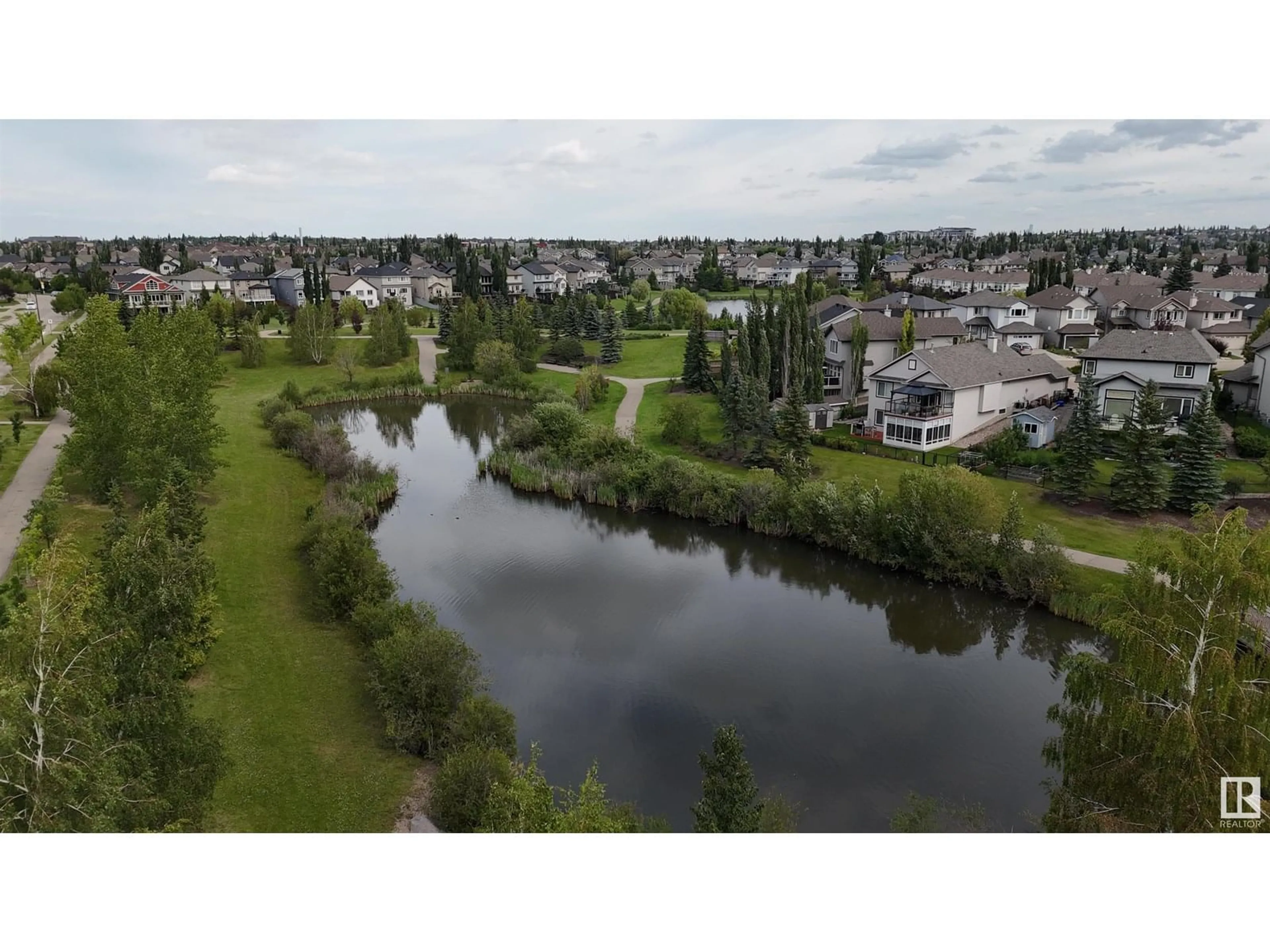 A pic from outside/outdoor area/front of a property/back of a property/a pic from drone, water/lake/river/ocean view for 7021 - 211 SOUTH TERWILLEGAR DR, Edmonton Alberta T6R0W5