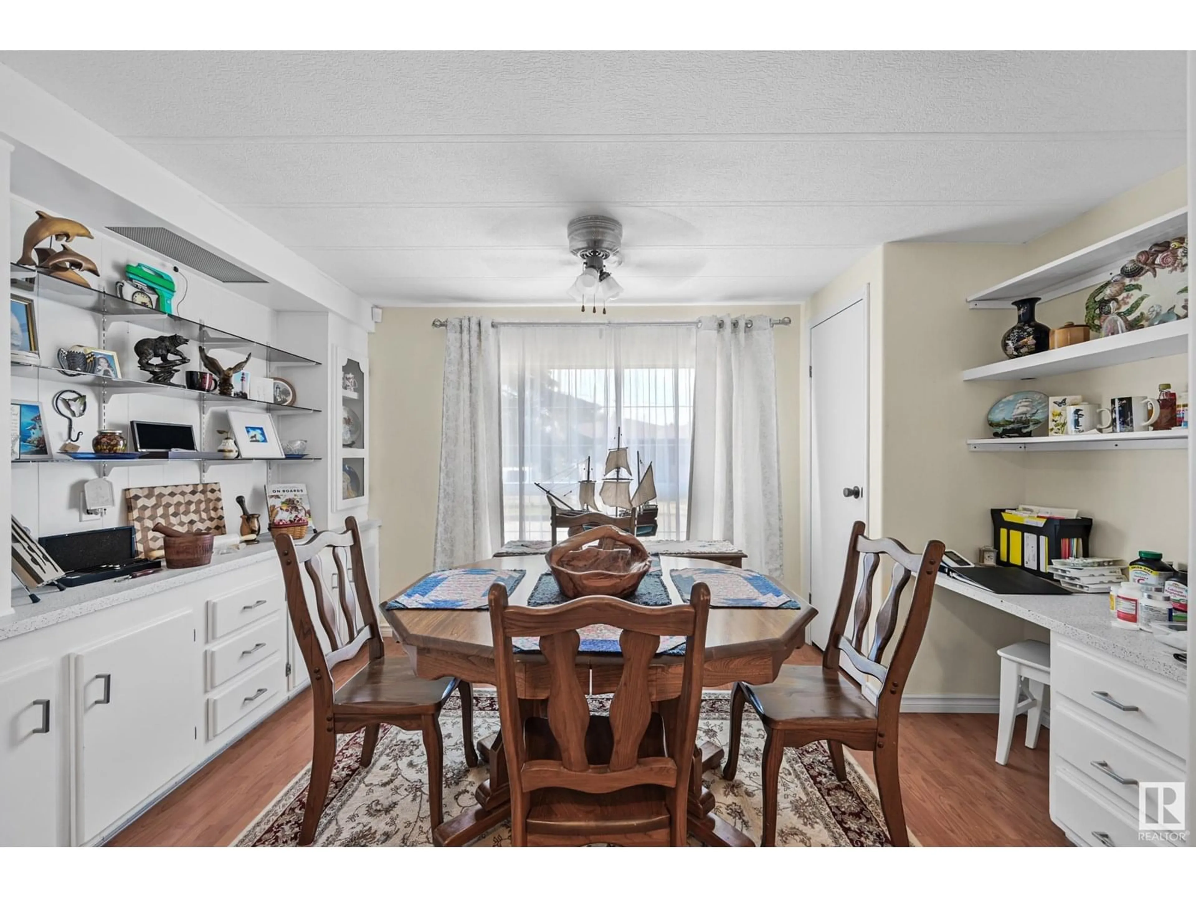 Dining room, wood/laminate floor for 305 CALAHOO RD, Spruce Grove Alberta T7X3K5