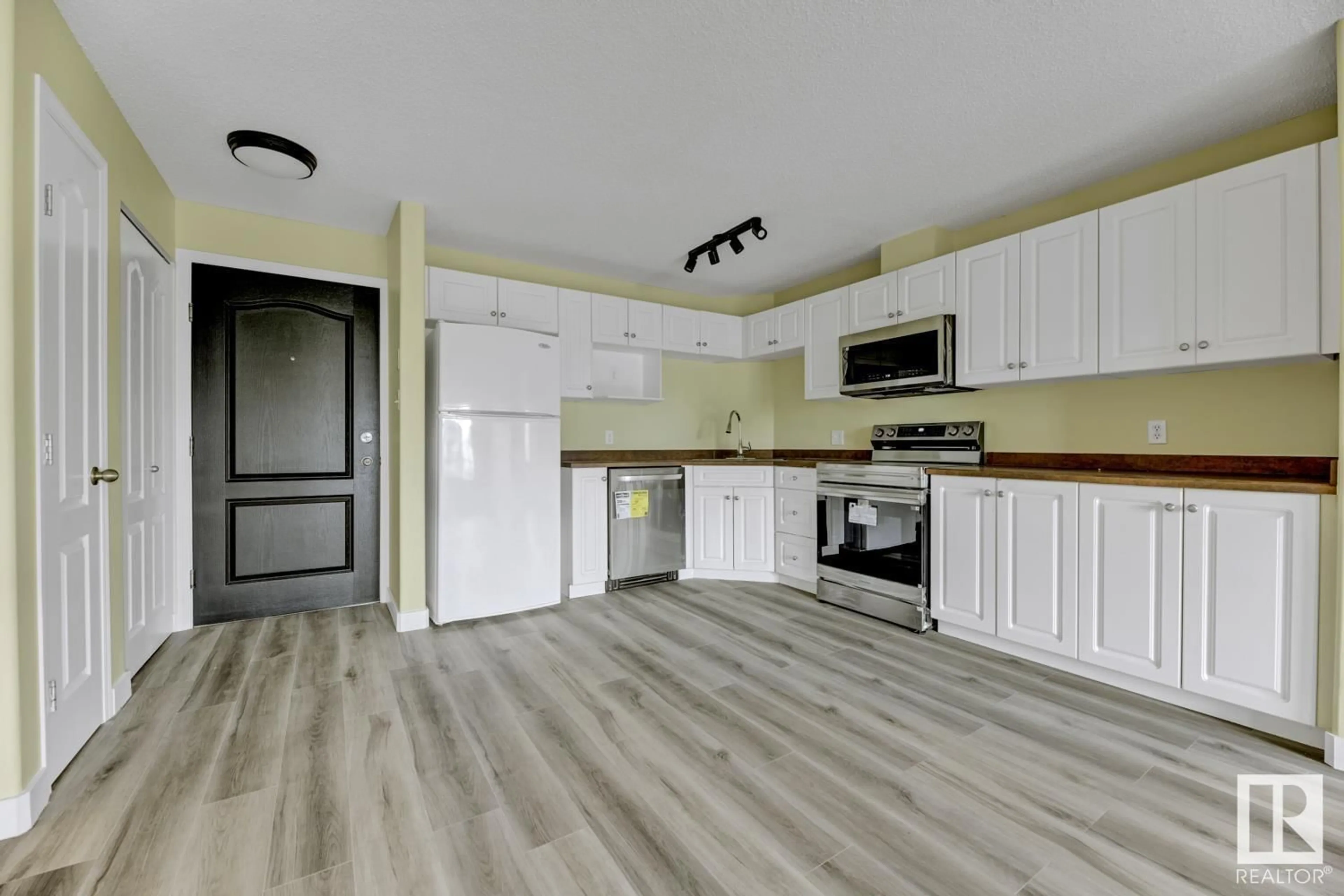 Open concept kitchen, unknown for #214 - 111 EDWARDS DR, Edmonton Alberta T5X1G2