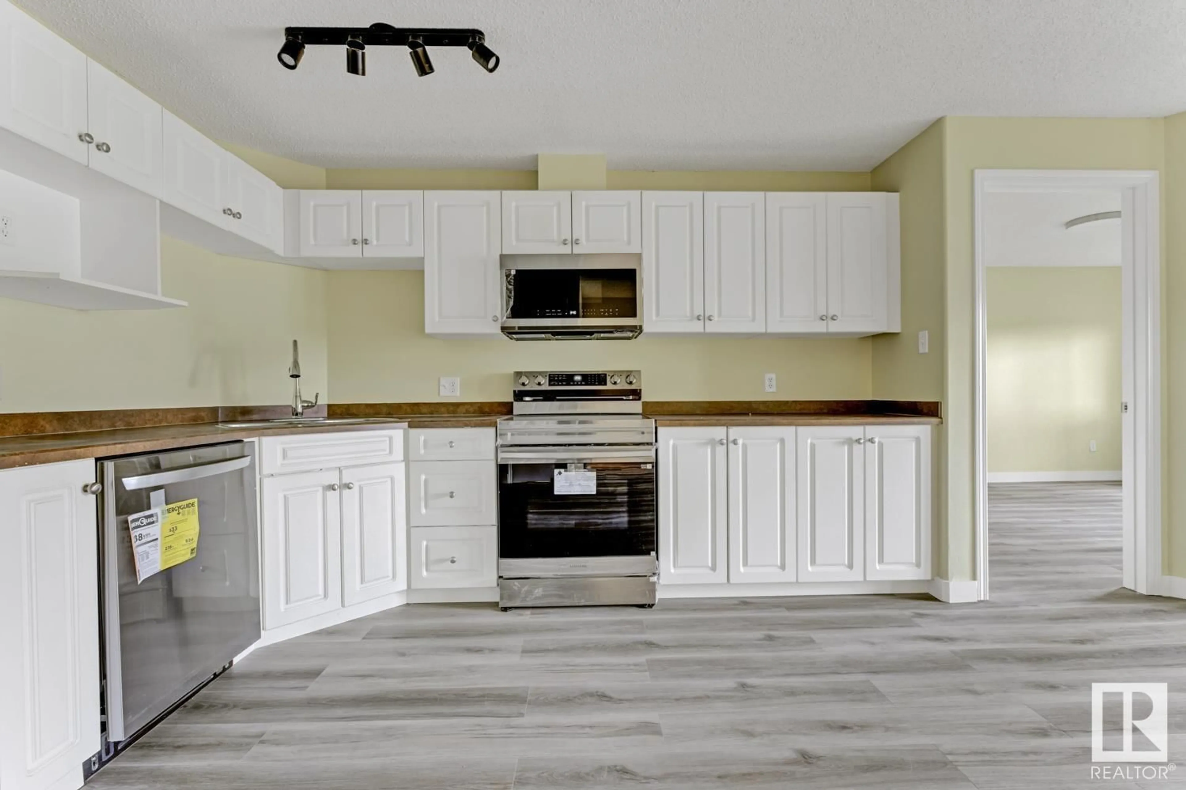 Standard kitchen, wood/laminate floor for #214 - 111 EDWARDS DR, Edmonton Alberta T5X1G2