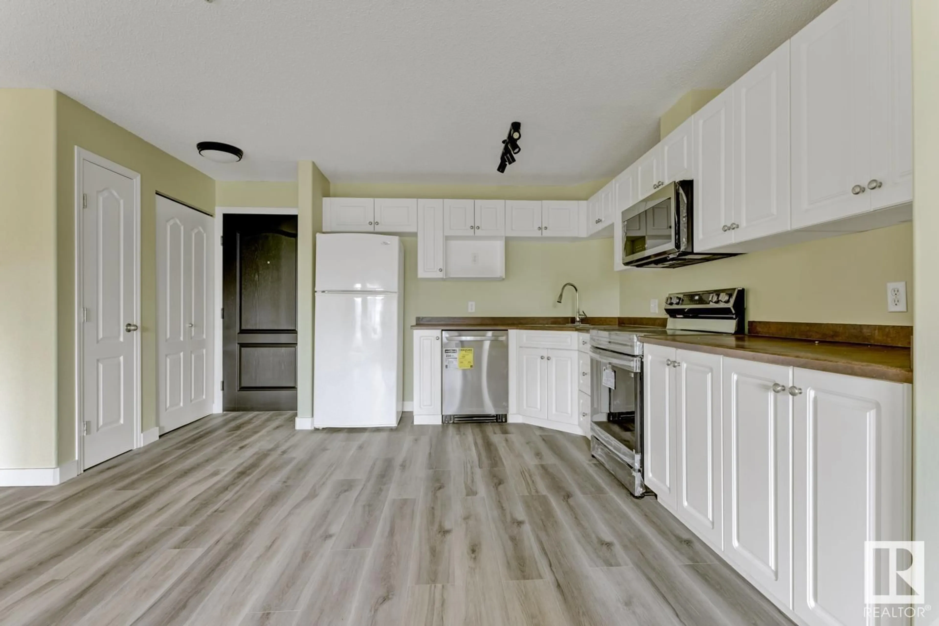 Open concept kitchen, unknown for #214 - 111 EDWARDS DR, Edmonton Alberta T5X1G2