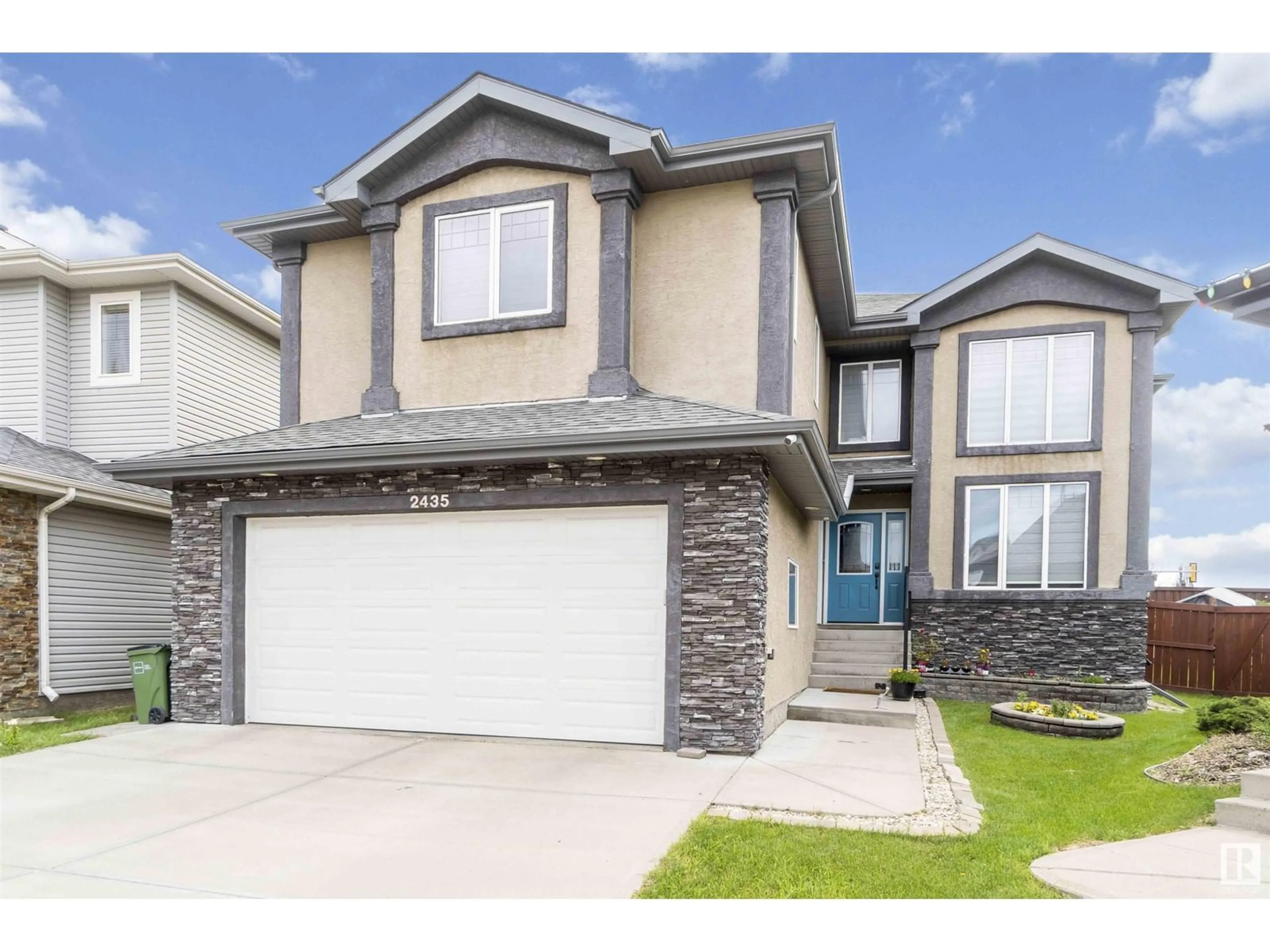 Home with vinyl exterior material, street for 2435 HAGEN WAY NW, Edmonton Alberta T6R3L5