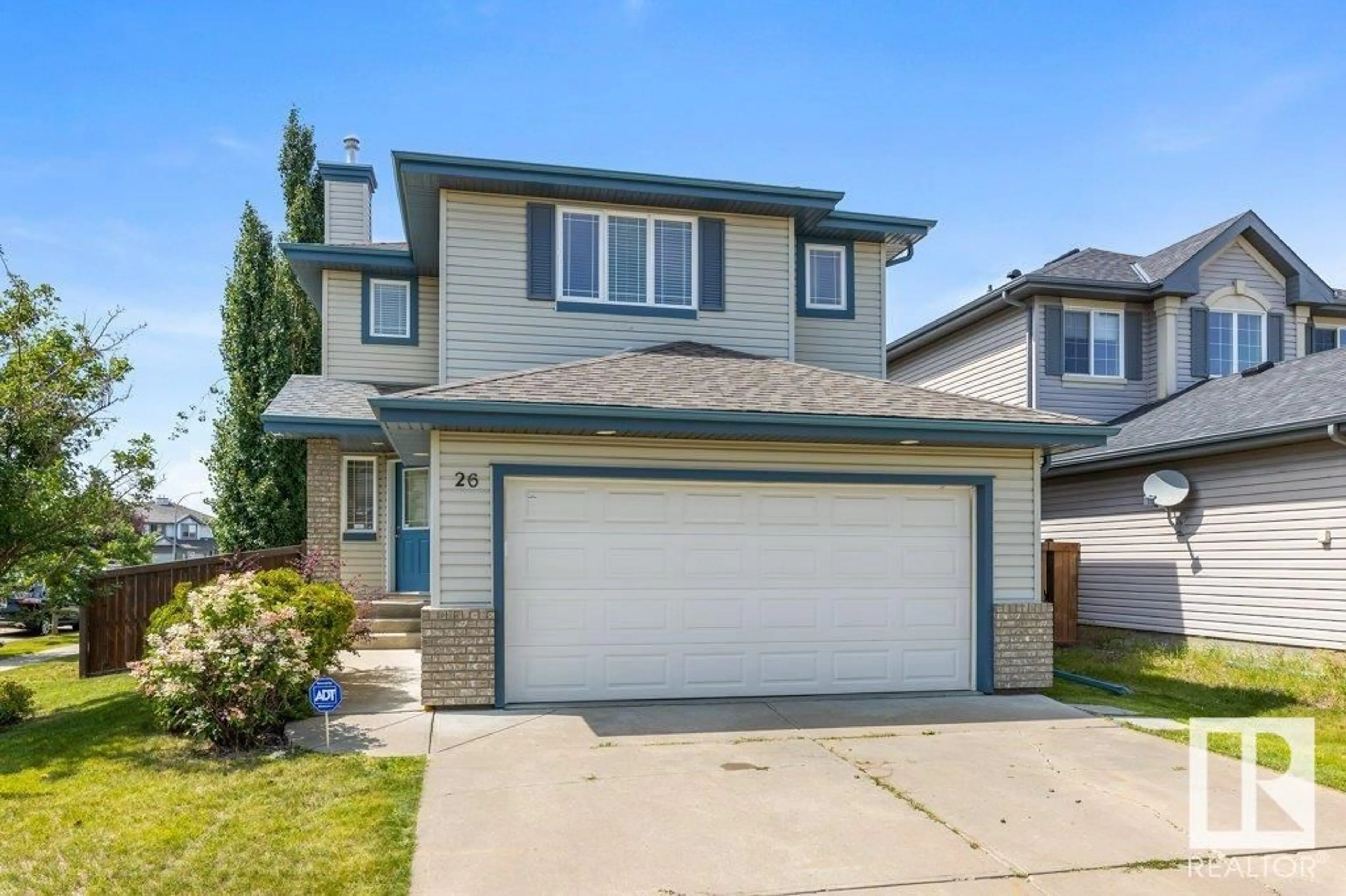 Home with vinyl exterior material, street for 26 NADINE WY, St. Albert Alberta T8N7M2