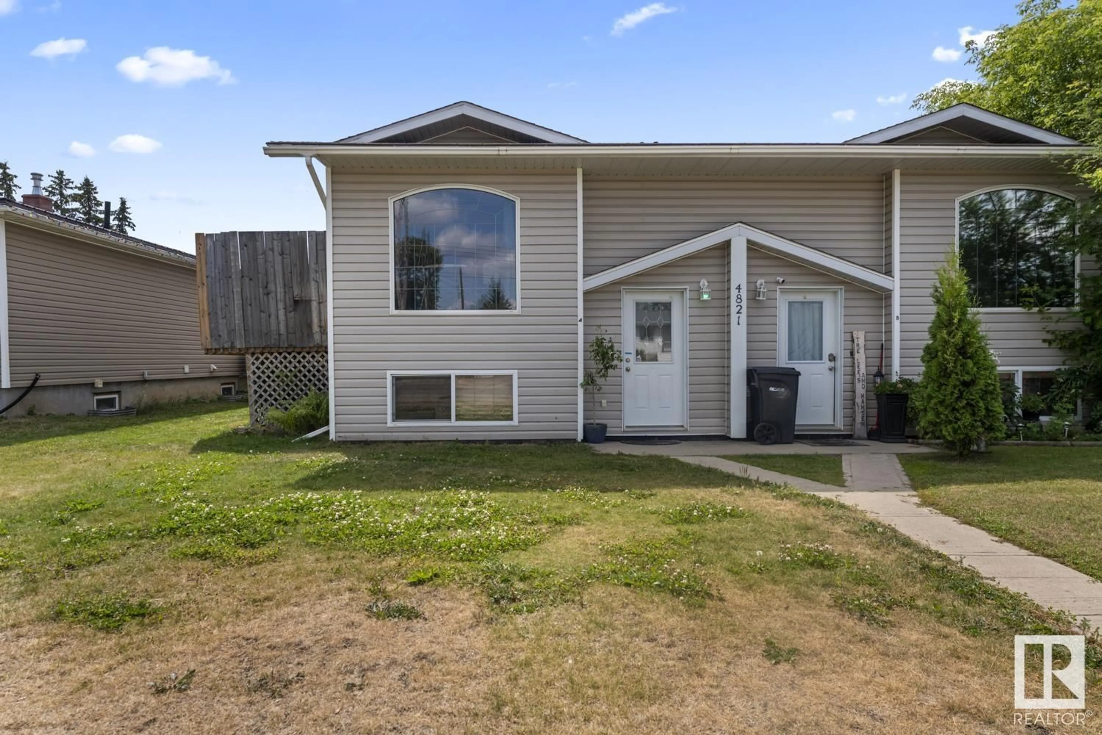 Home with vinyl exterior material, street for 4821A 50 AV, Cold Lake Alberta T9M1Y2