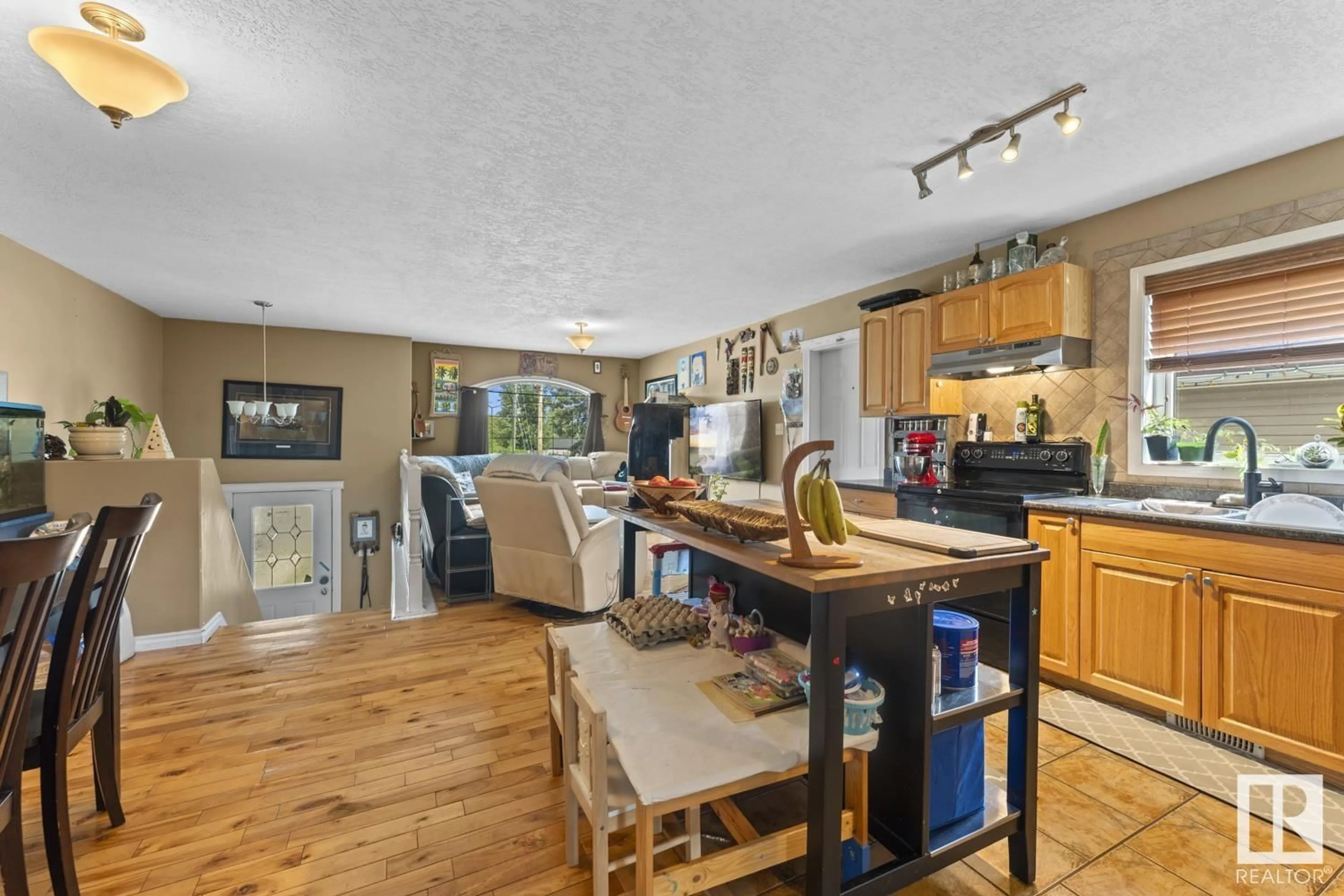 Open concept kitchen, wood/laminate floor for 4821A 50 AV, Cold Lake Alberta T9M1Y2