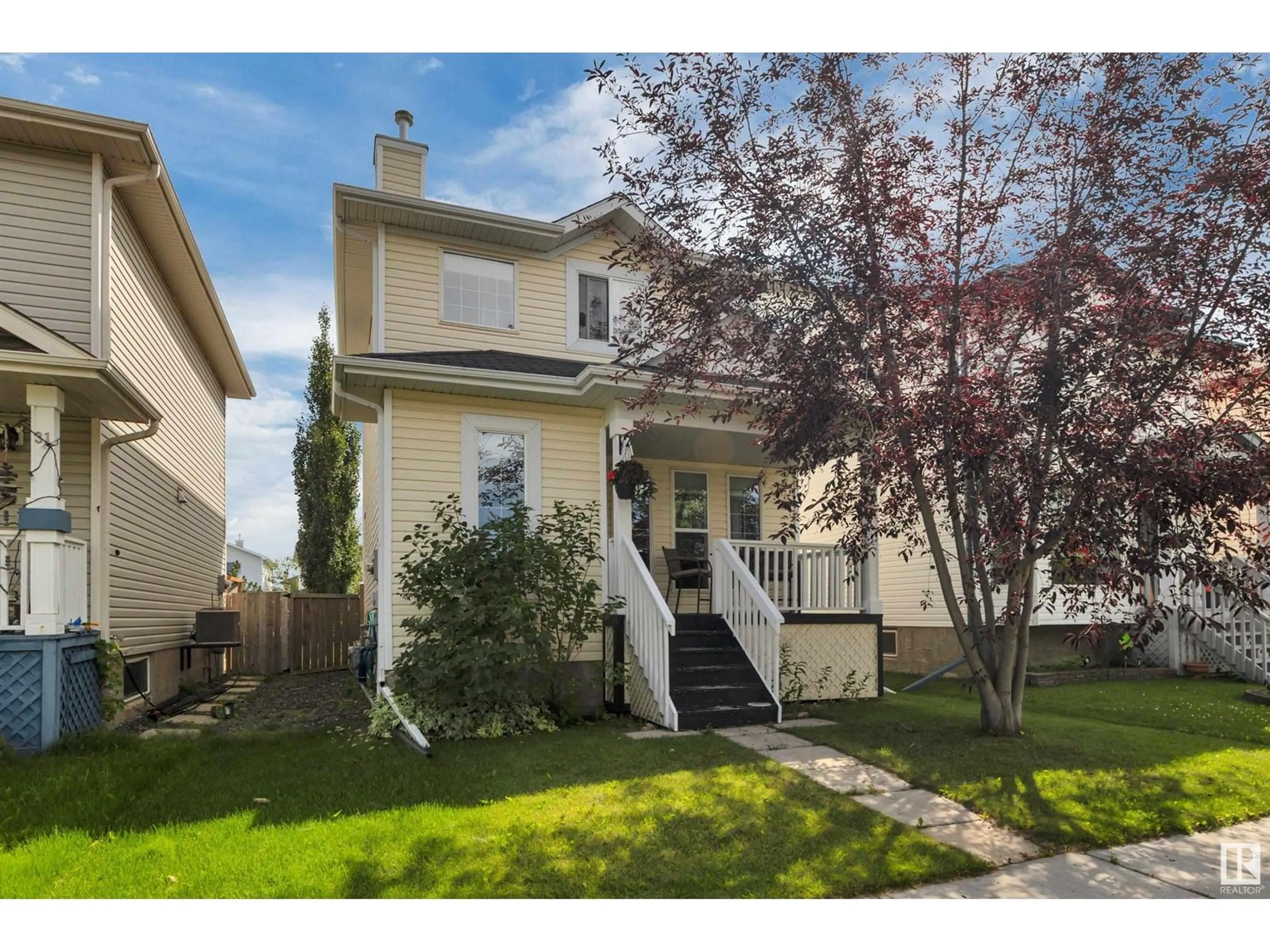 Home with vinyl exterior material, street for 33 DOUGLAS LN, Leduc Alberta T9E8P5