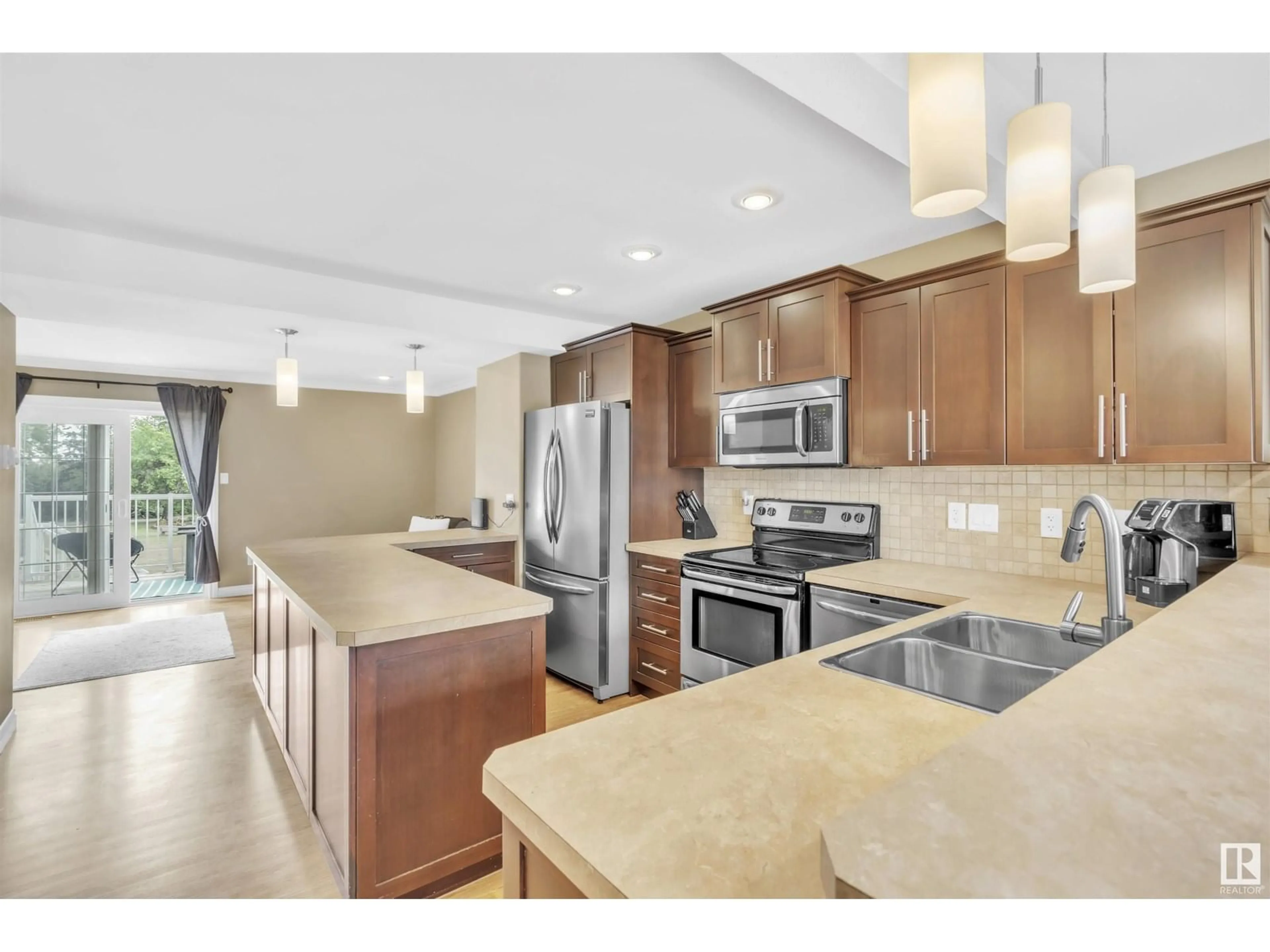 Open concept kitchen, ceramic/tile floor for 15 - 1001 7 AV, Cold Lake Alberta T9M0C4