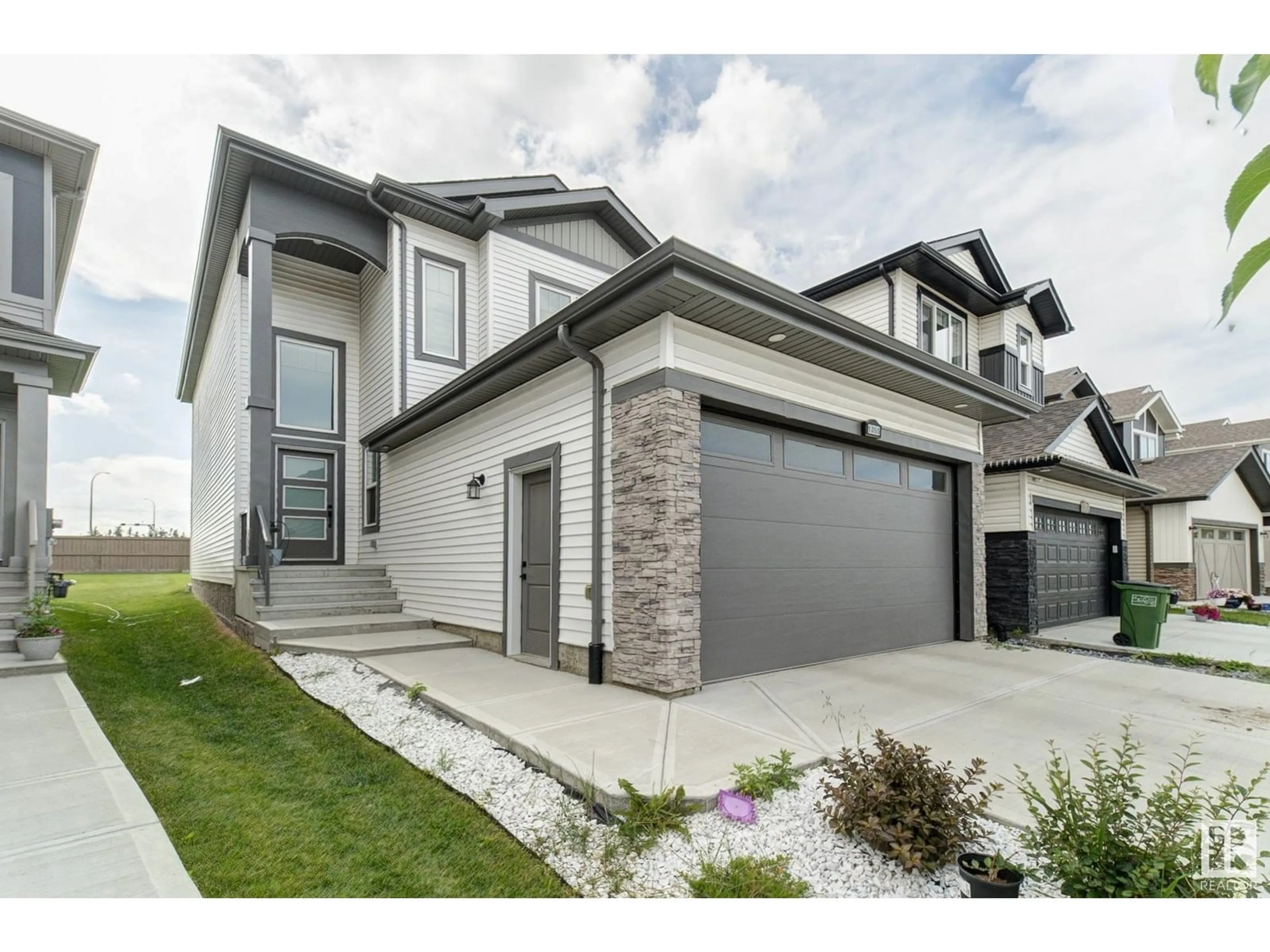 Home with vinyl exterior material, street for NW - 1355 20 ST, Edmonton Alberta T6T2R7