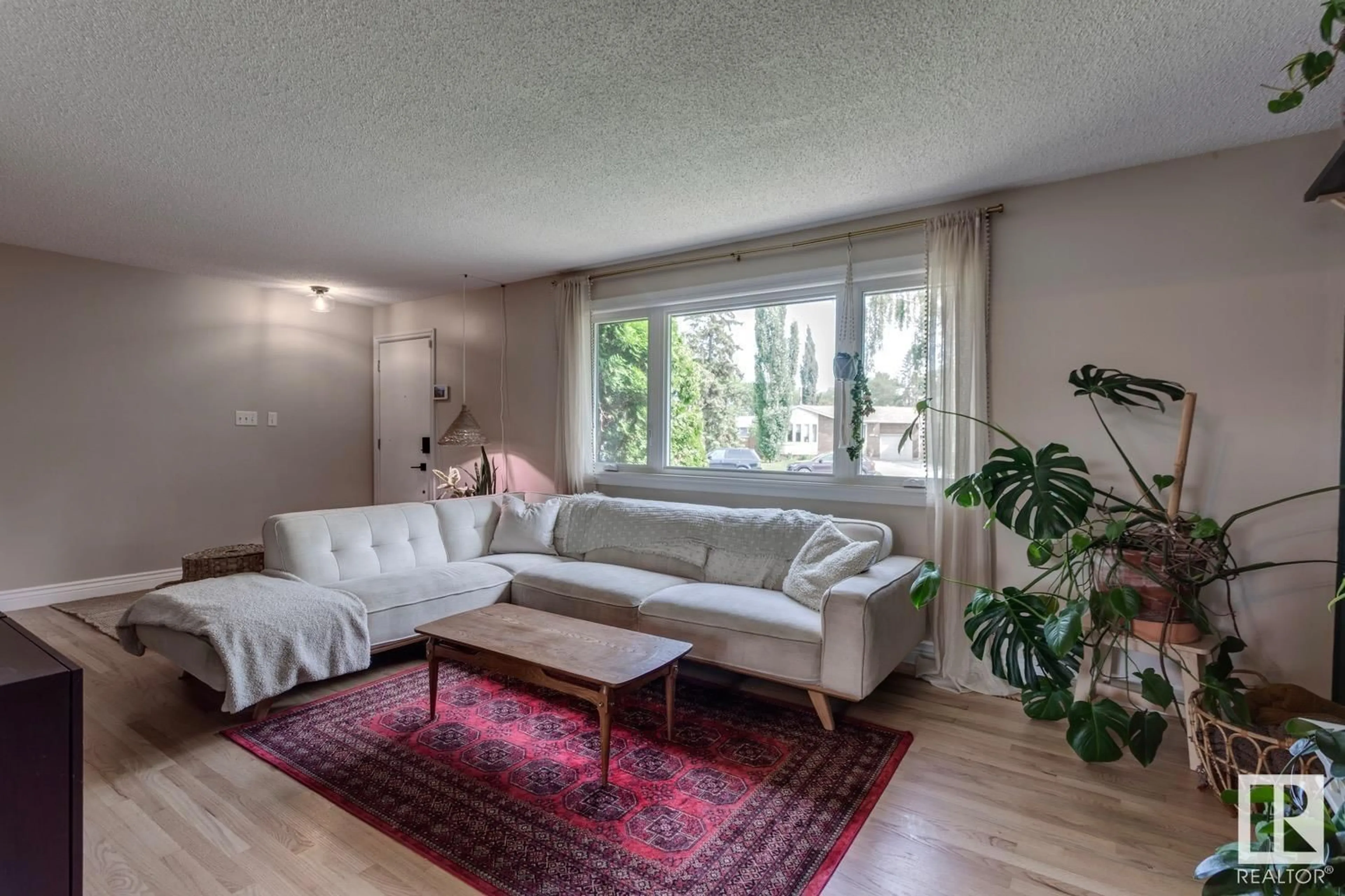 Living room with furniture, unknown for 16115 90 AV, Edmonton Alberta T5R4W7