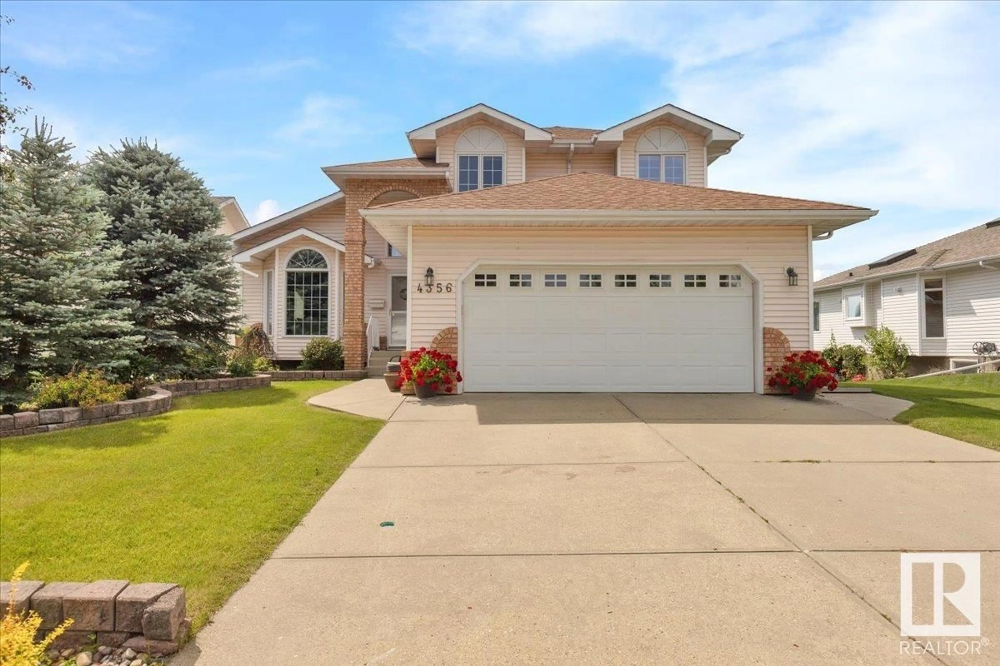 Home with vinyl exterior material, street for 4356 31 ST, Edmonton Alberta T6T1C2