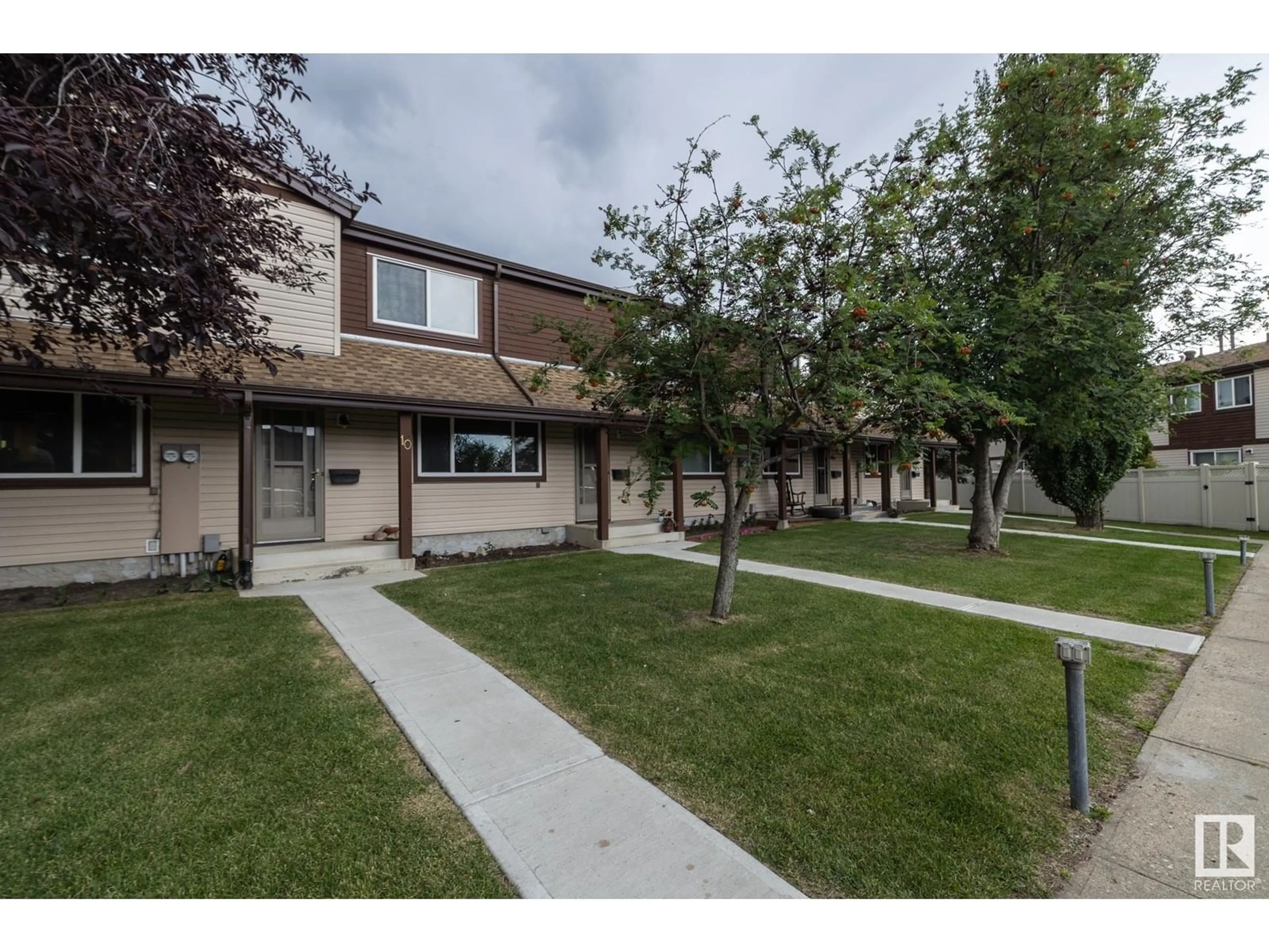 A pic from outside/outdoor area/front of a property/back of a property/a pic from drone, street for #10 - 13833 30 ST, Edmonton Alberta T5Y2B2