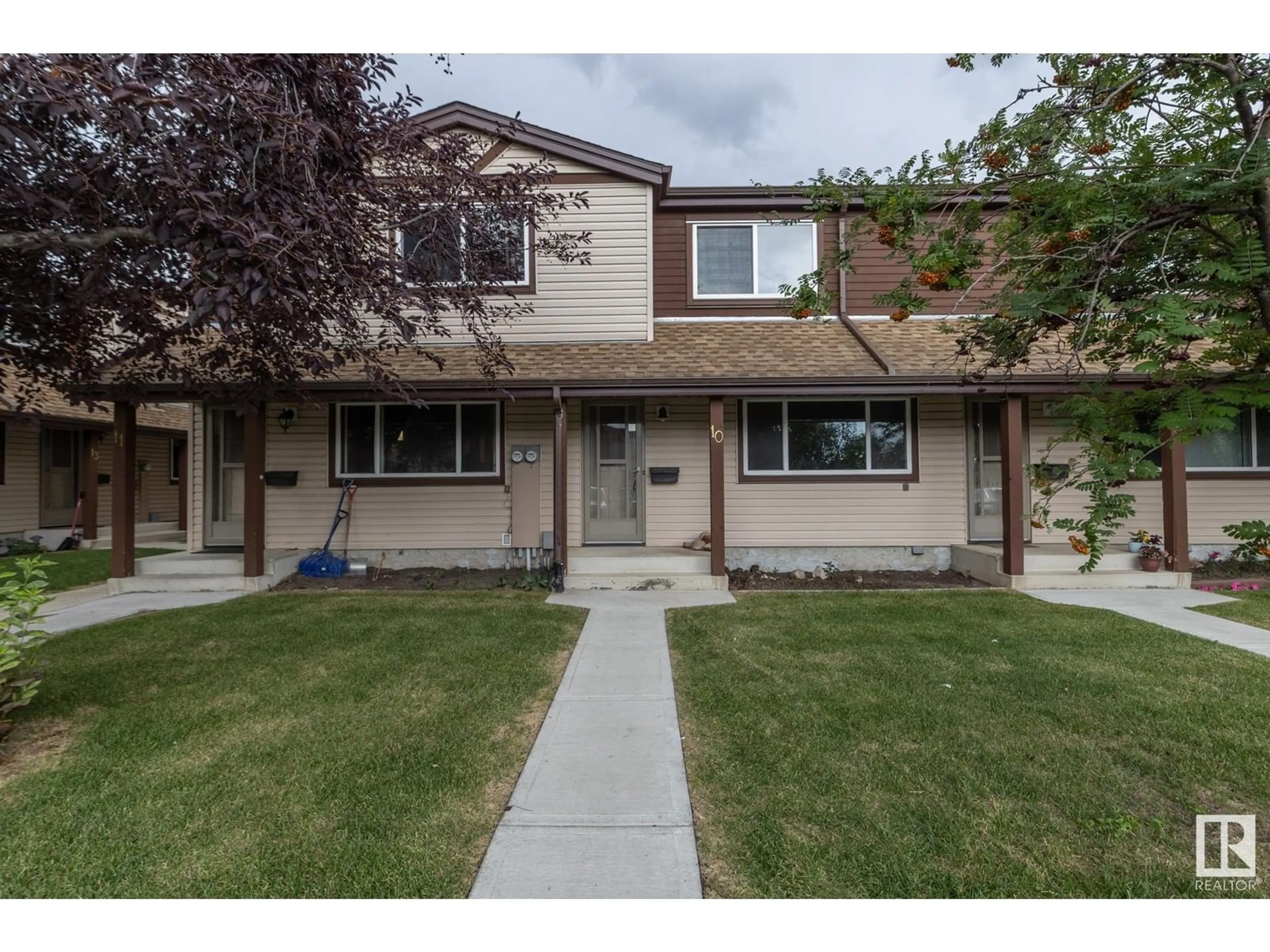 Home with vinyl exterior material, street for #10 - 13833 30 ST, Edmonton Alberta T5Y2B2