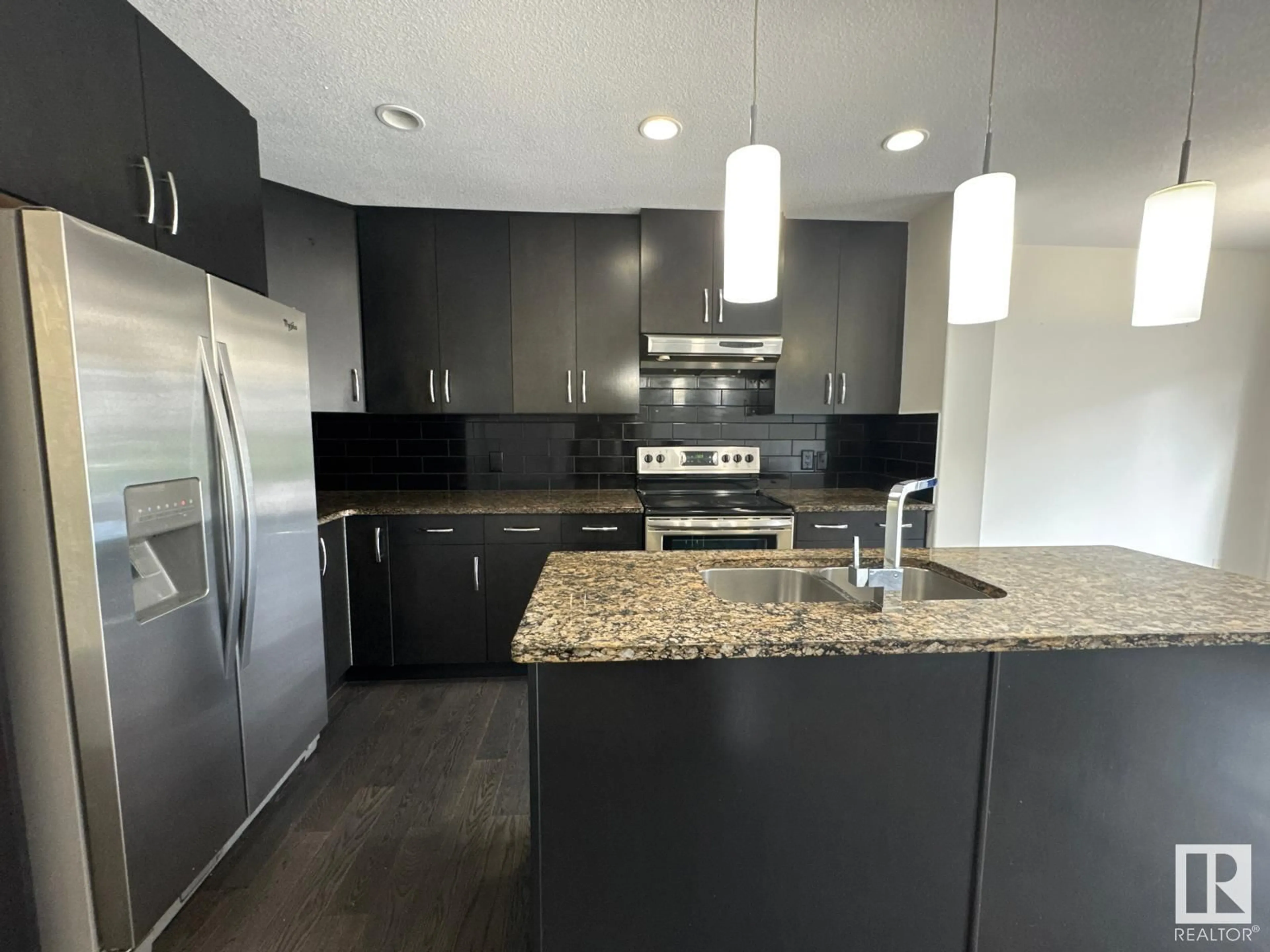 Open concept kitchen, unknown for 611 40 AV, Edmonton Alberta T6T0T5