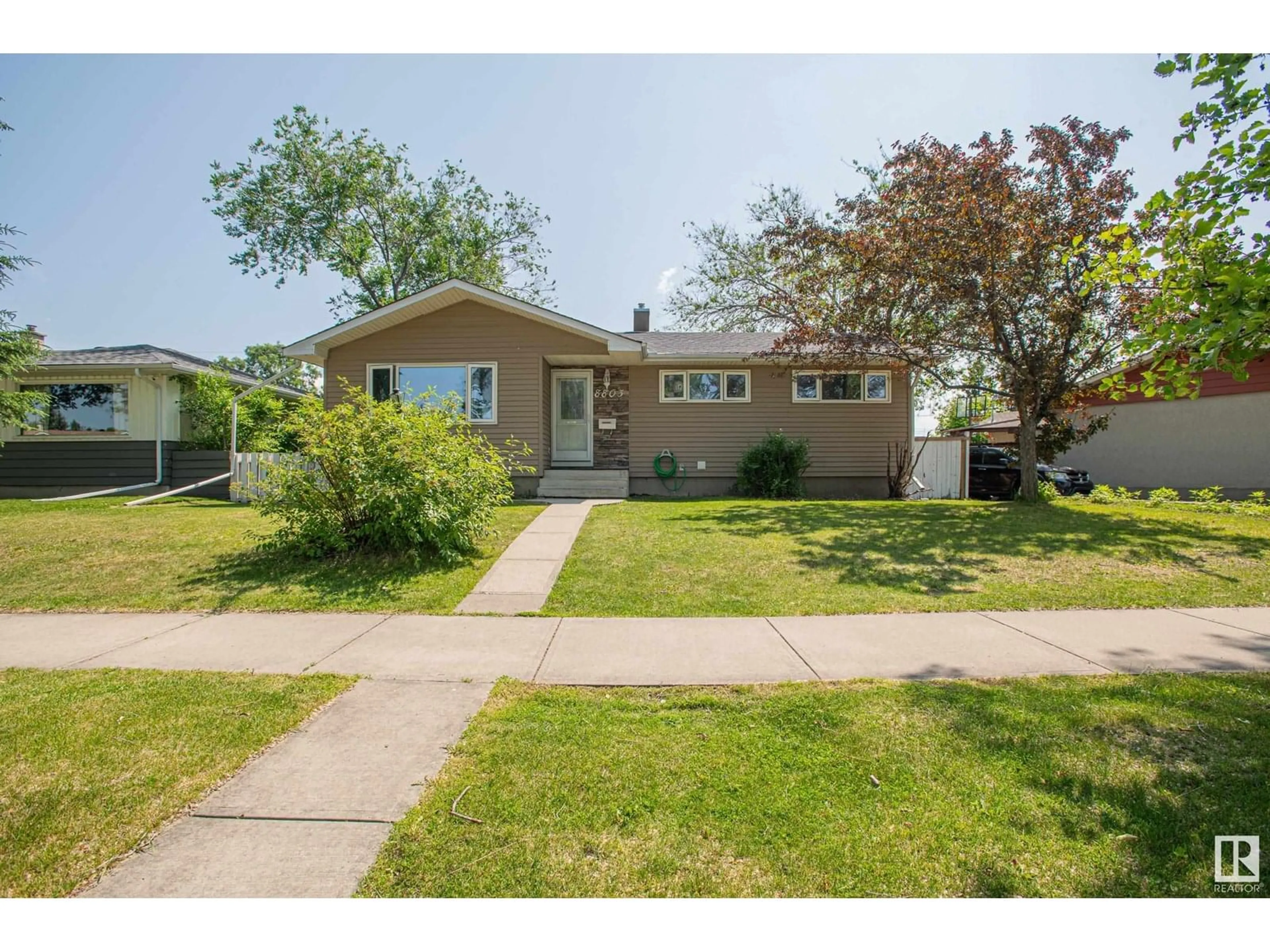 Home with vinyl exterior material, street for 8803 160 ST, Edmonton Alberta T5R2H6