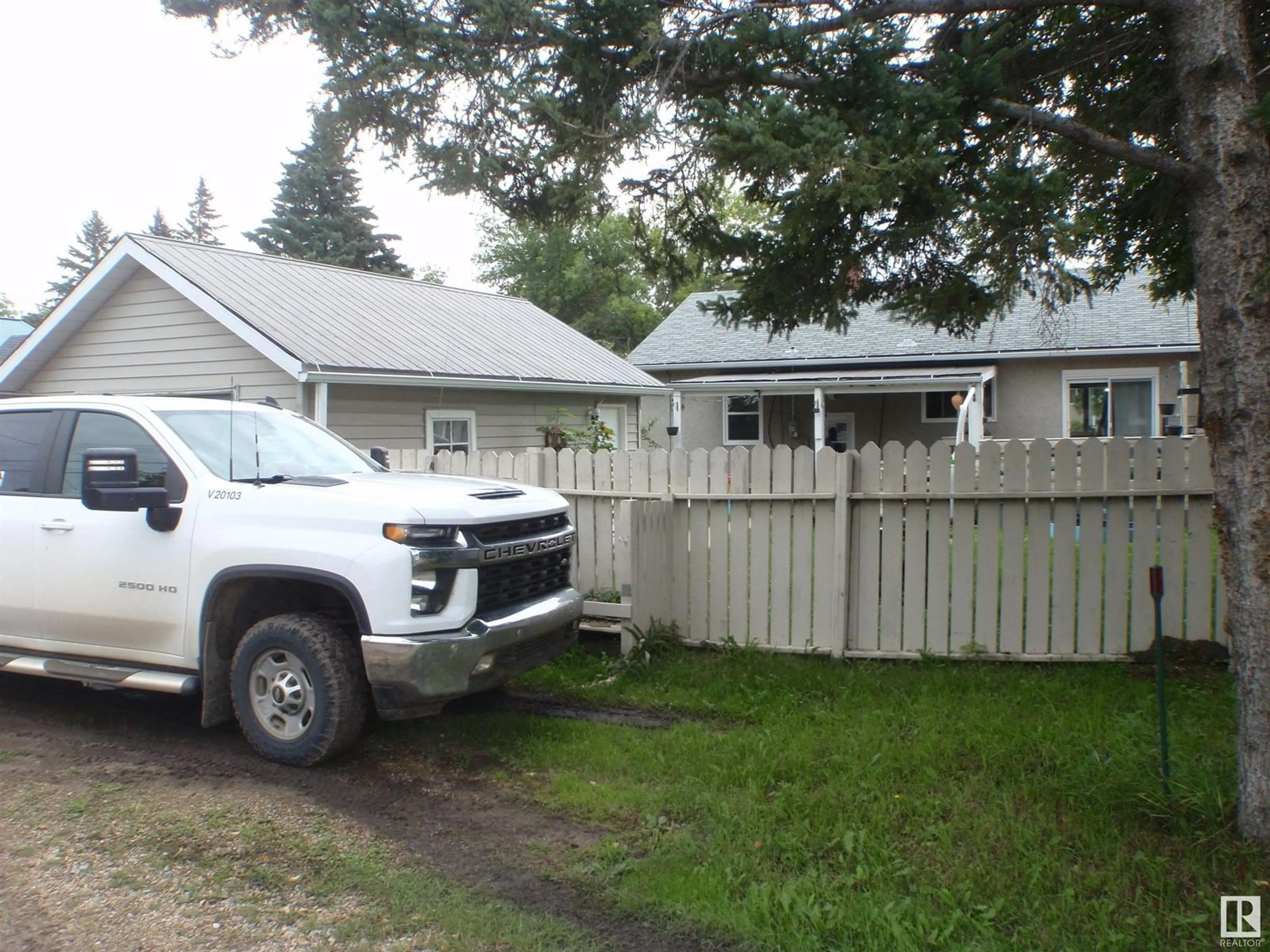 A pic from outside/outdoor area/front of a property/back of a property/a pic from drone, street for 5112 53 ST, Barrhead Alberta T7N1E8