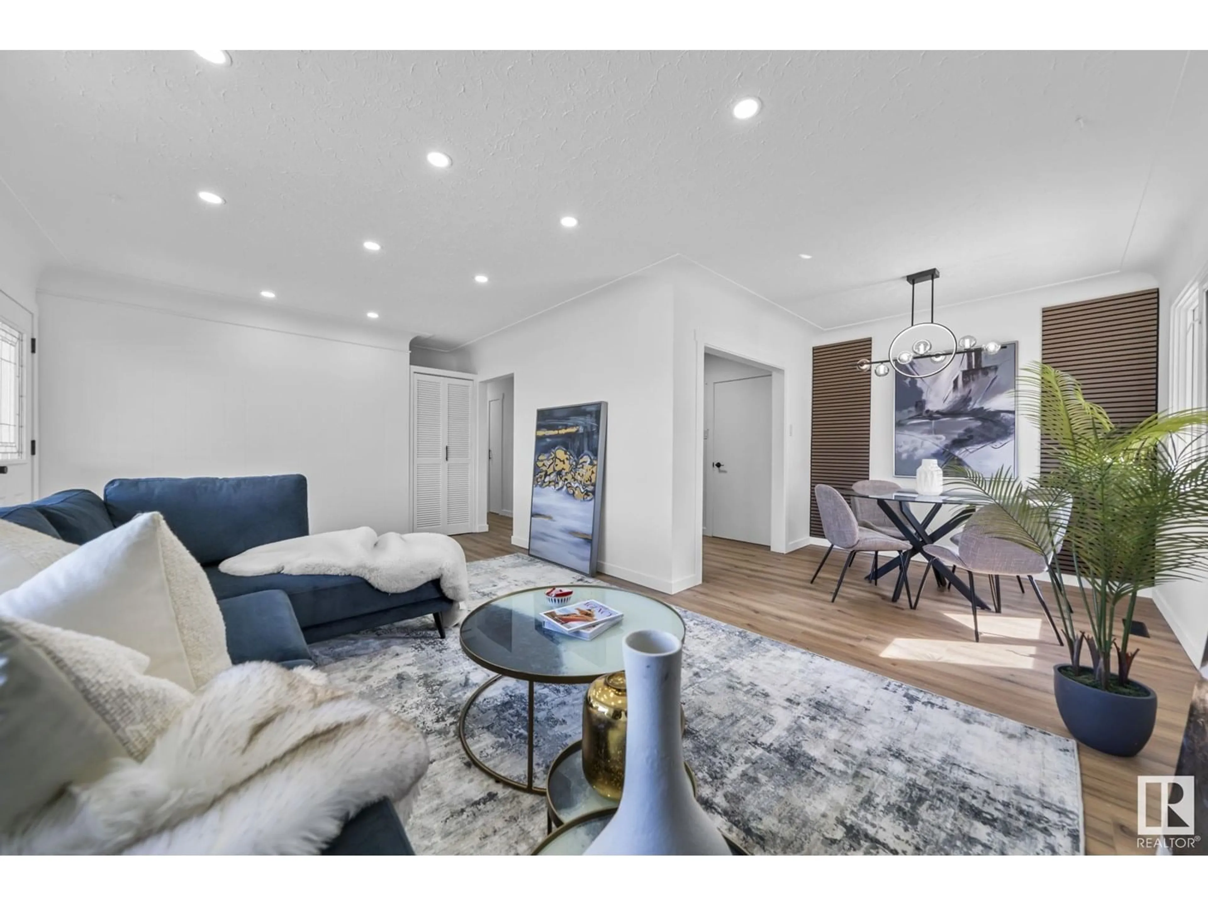 Living room with furniture, wood/laminate floor for 13123 85 ST, Edmonton Alberta T5E2Z5