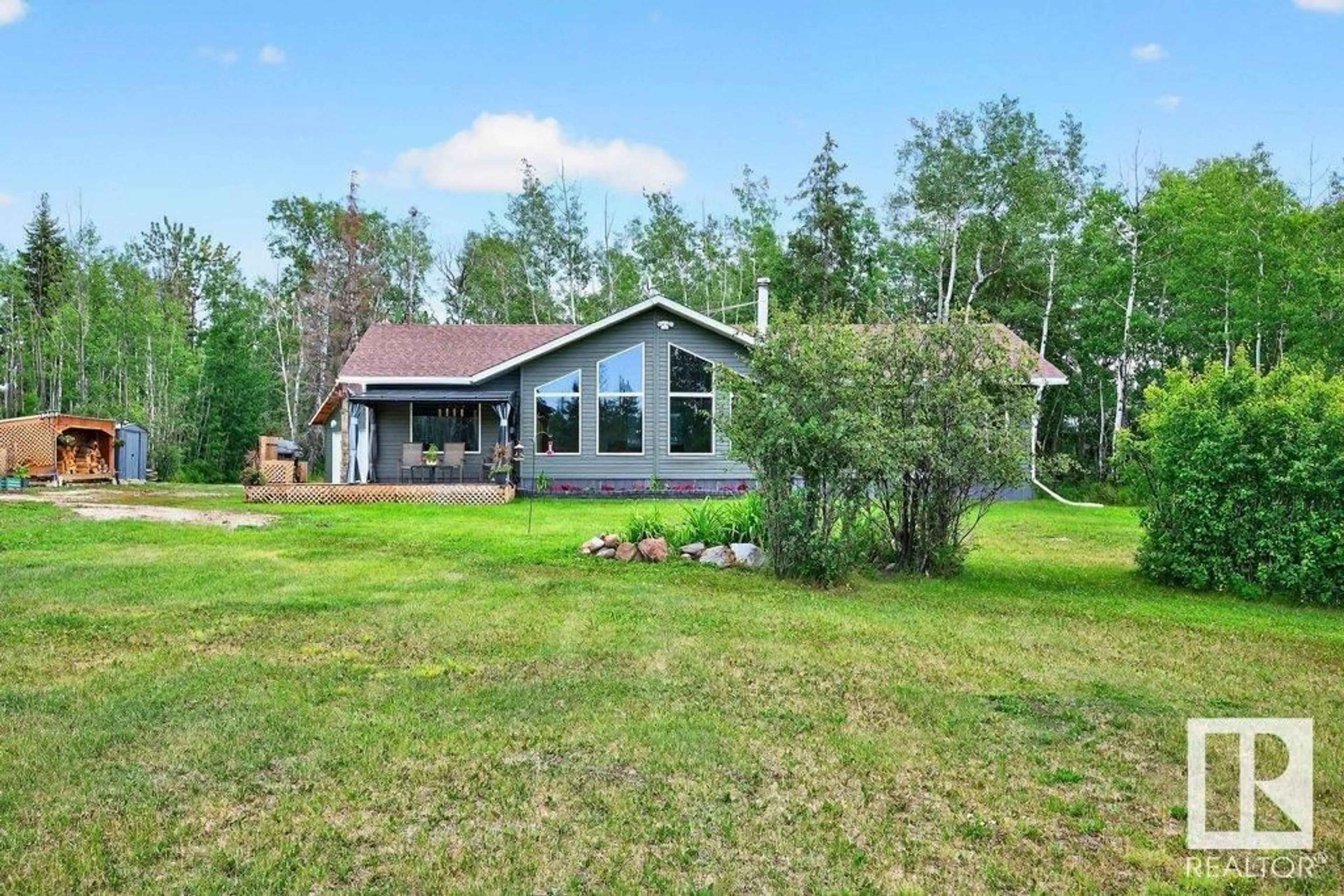 A pic from outside/outdoor area/front of a property/back of a property/a pic from drone, water/lake/river/ocean view for 21 - 129 50529 RR, Rural Parkland County Alberta T7Y2N4