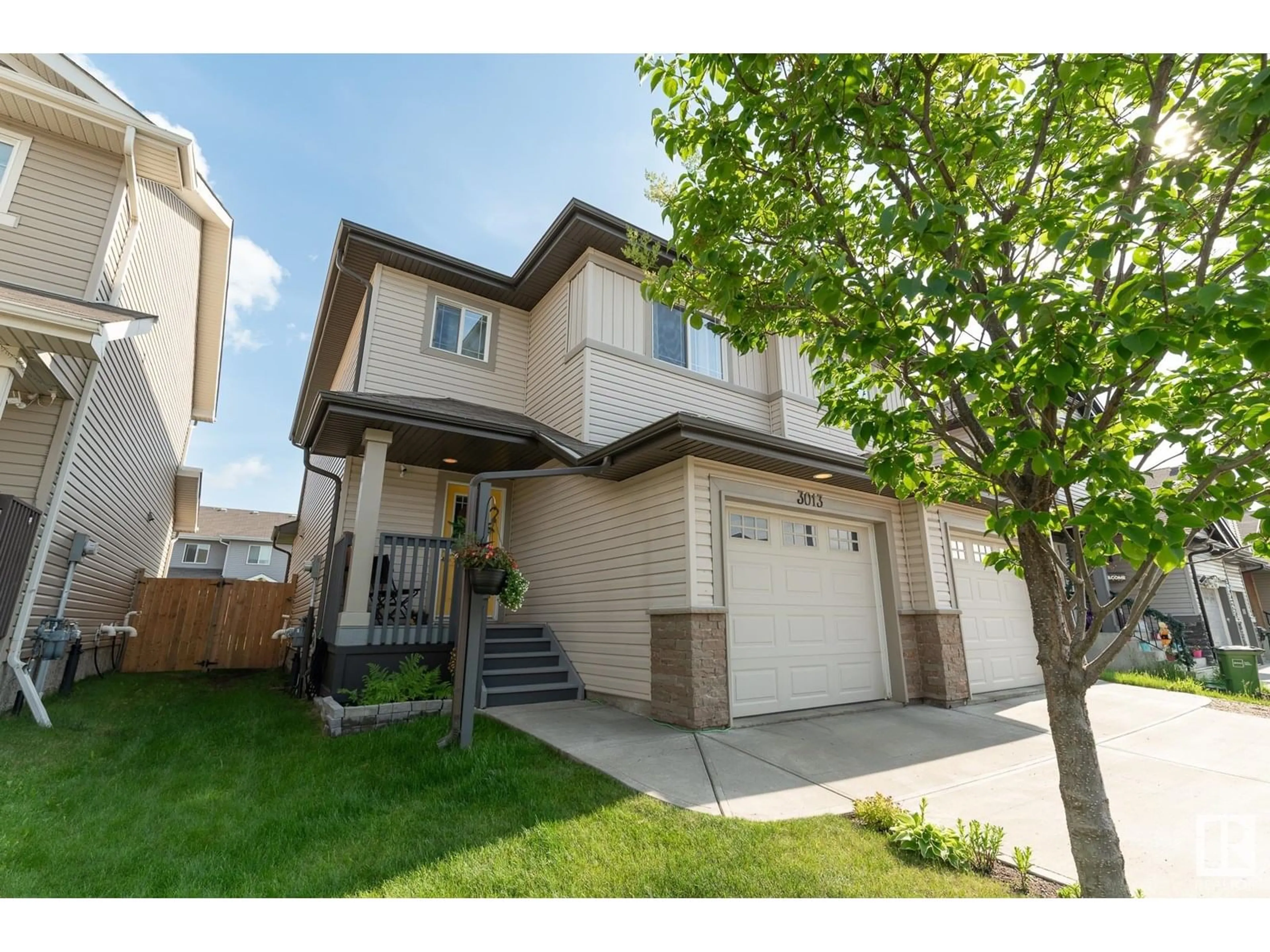 Home with vinyl exterior material, street for 3013 16A AV, Edmonton Alberta T6T0P8