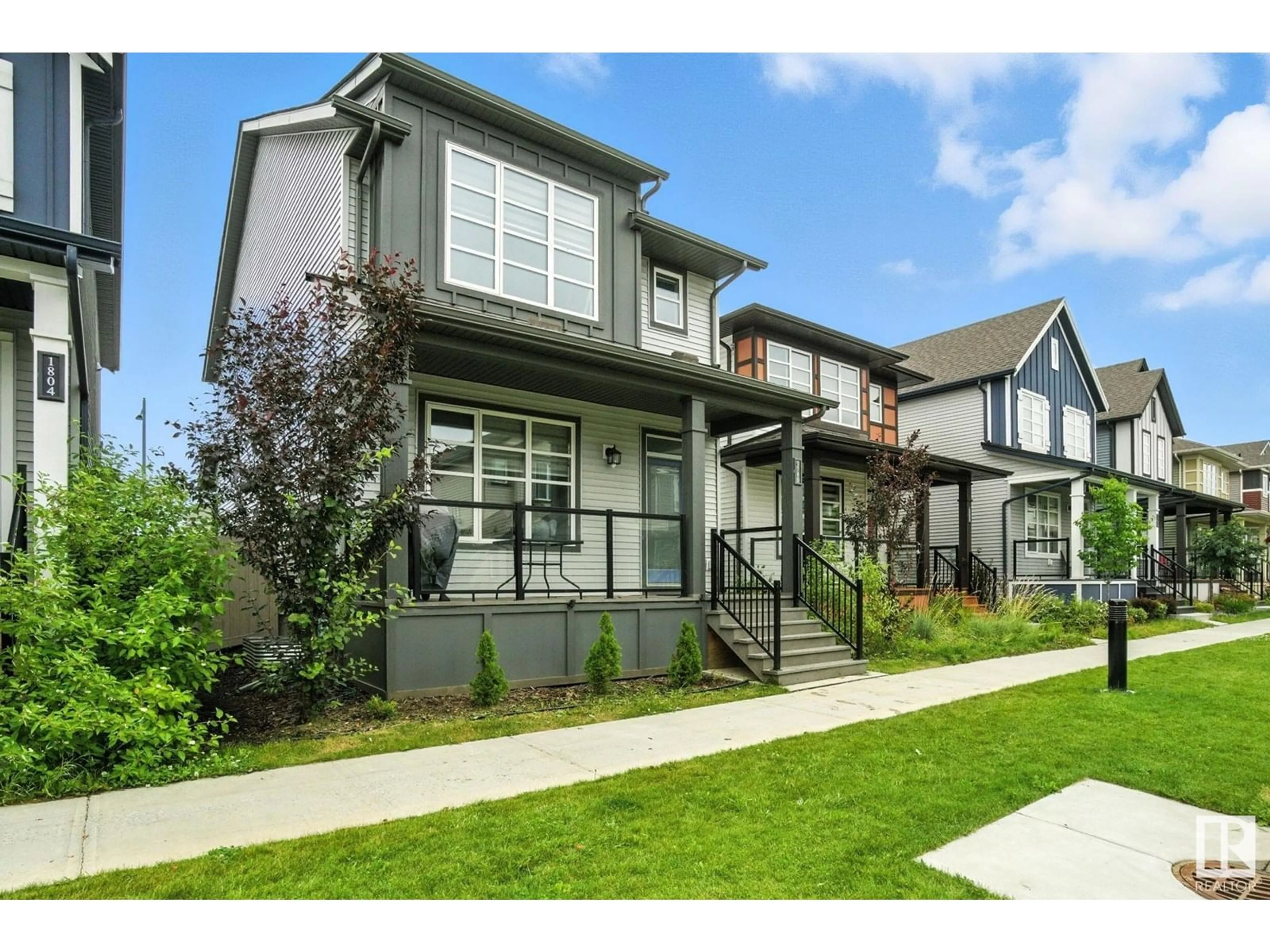 Home with vinyl exterior material, street for NW - 1780 25 ST, Edmonton Alberta T6T2H7
