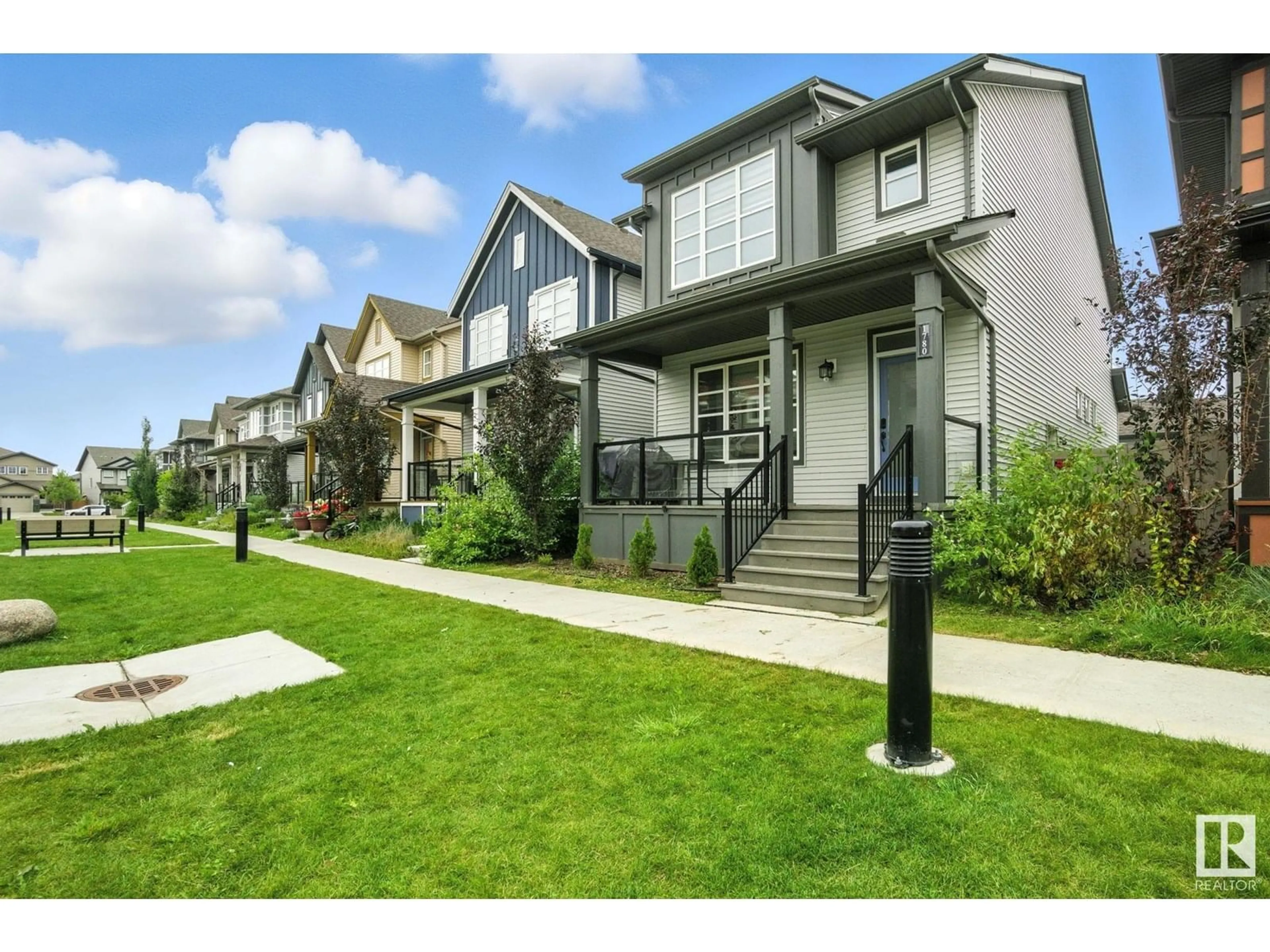 Home with vinyl exterior material, street for NW - 1780 25 ST, Edmonton Alberta T6T2H7