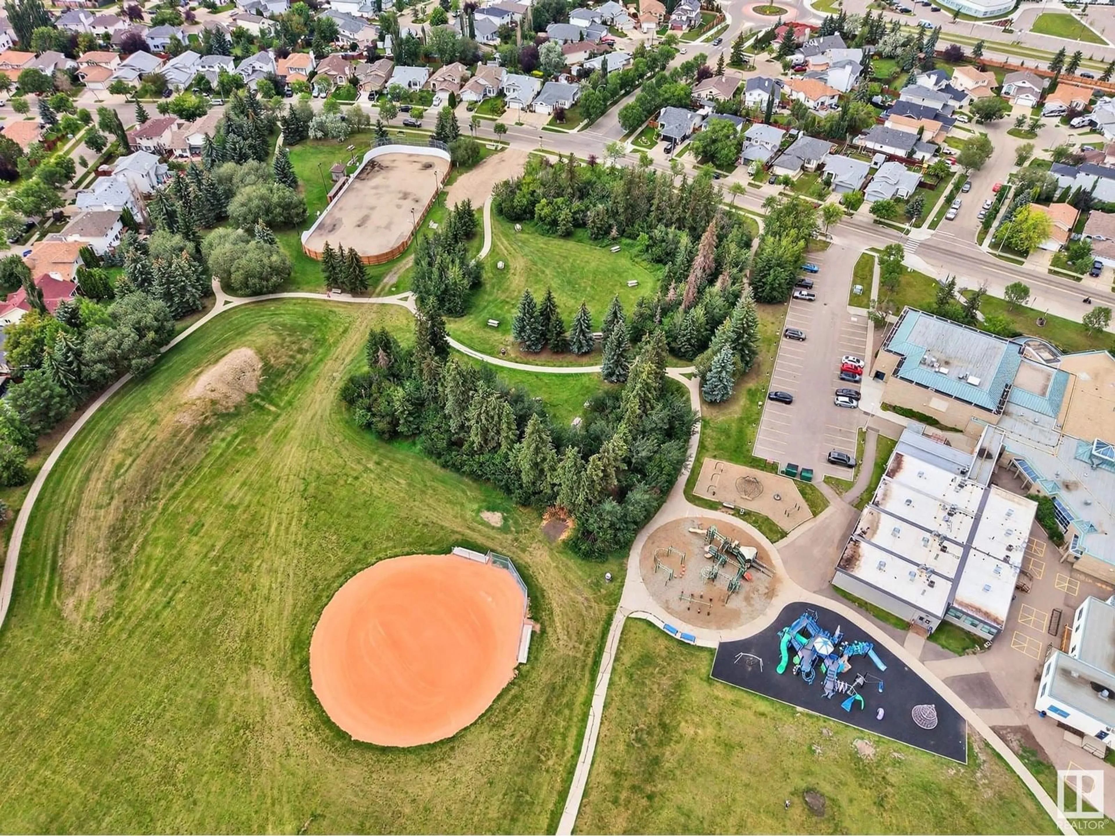 A pic from outside/outdoor area/front of a property/back of a property/a pic from drone, mountain view for 338 JENSEN LAKES BV, St. Albert Alberta T8N7Z4