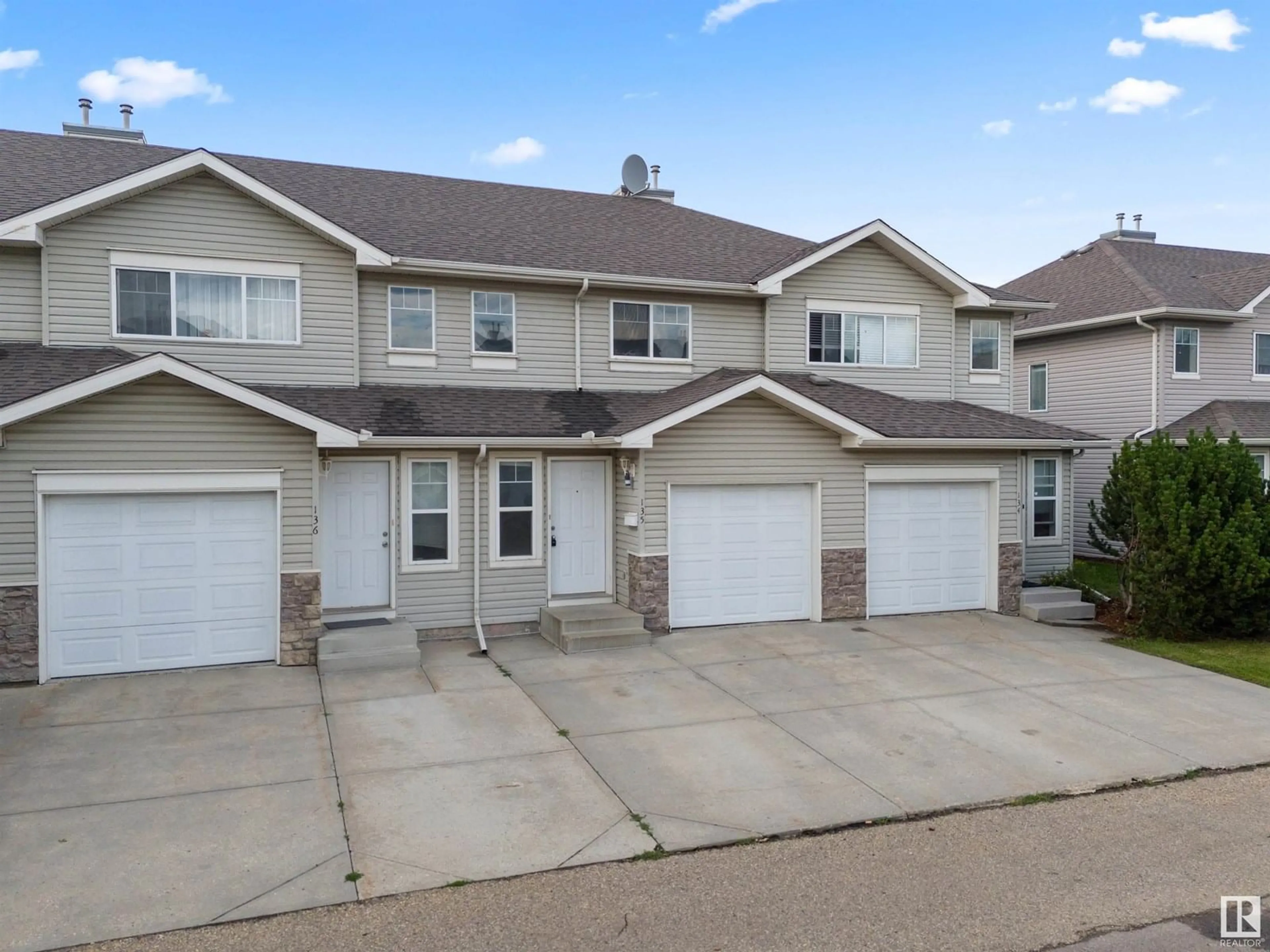 Home with vinyl exterior material, street for 230 EDWARDS DR, Edmonton Alberta T6X1G7
