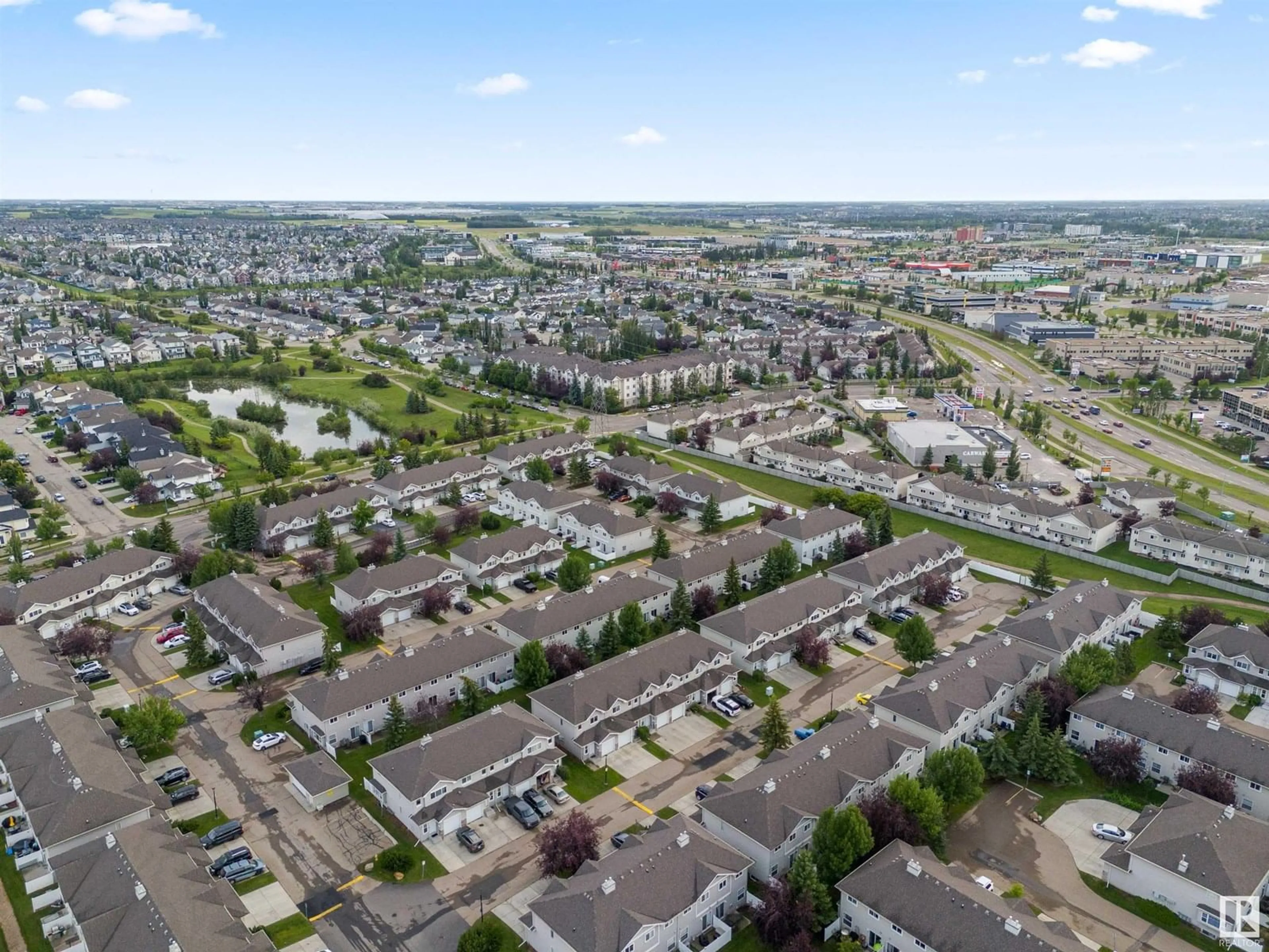A pic from outside/outdoor area/front of a property/back of a property/a pic from drone, street for 230 EDWARDS DR, Edmonton Alberta T6X1G7