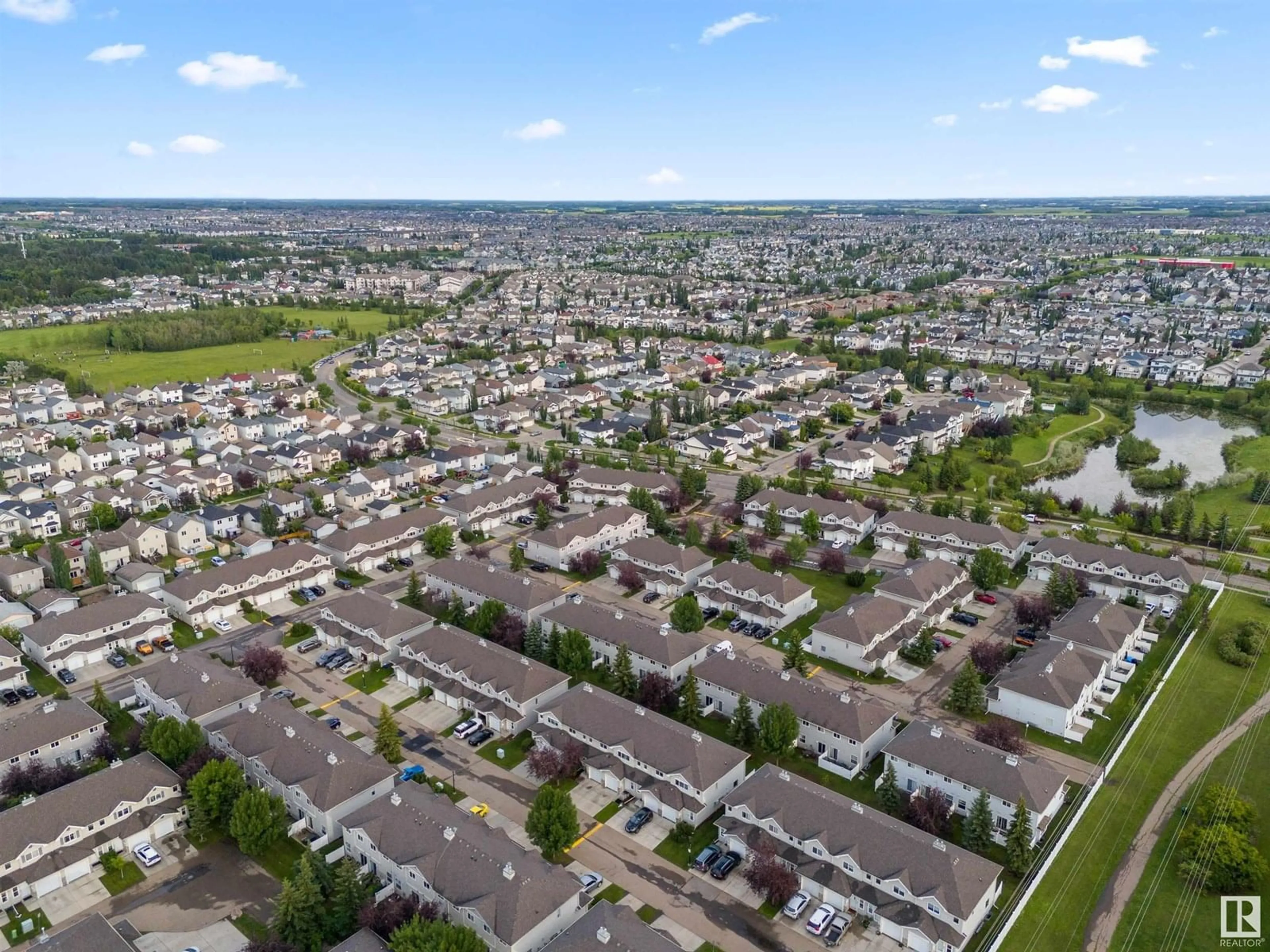 A pic from outside/outdoor area/front of a property/back of a property/a pic from drone, street for 230 EDWARDS DR, Edmonton Alberta T6X1G7