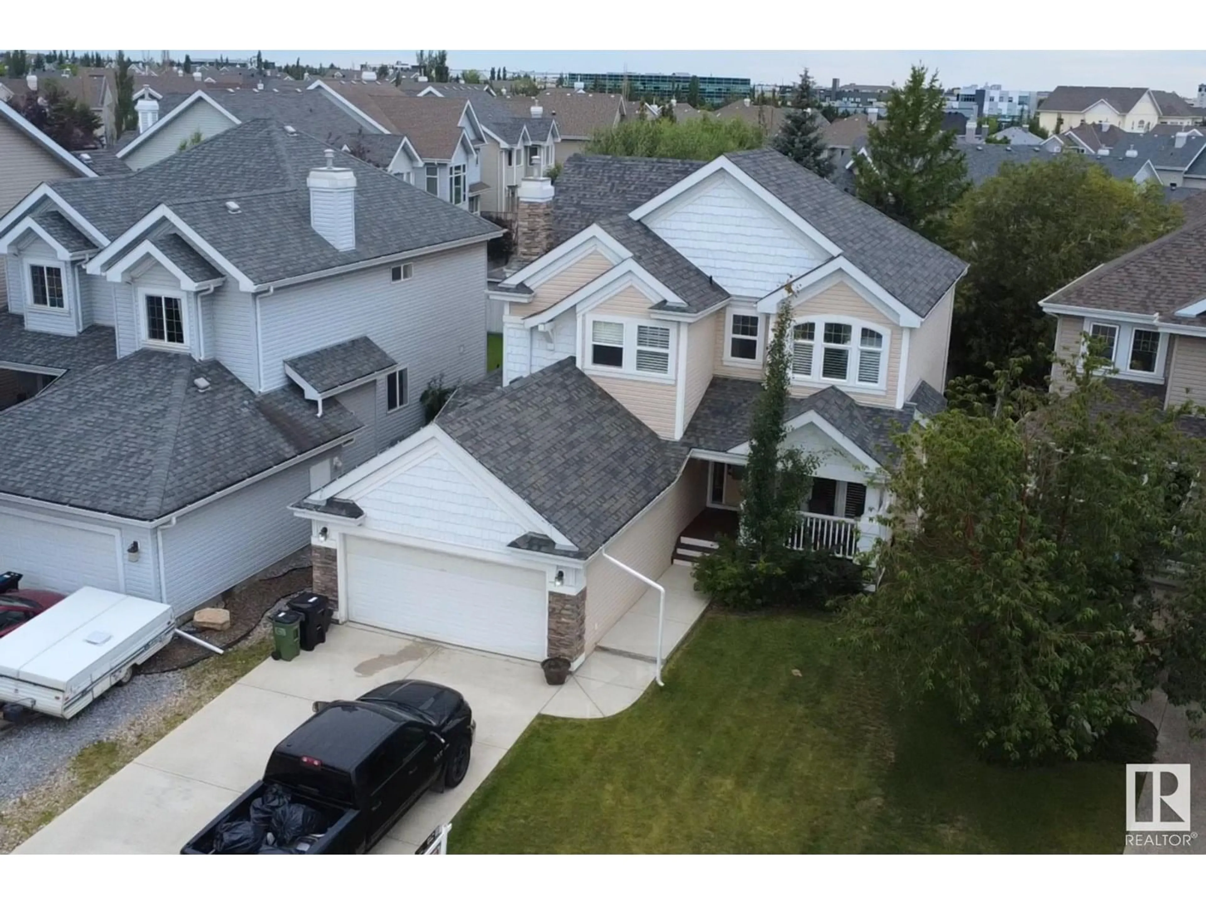 A pic from outside/outdoor area/front of a property/back of a property/a pic from drone, street for 446 SPARLING CO, Edmonton Alberta T6X1G9