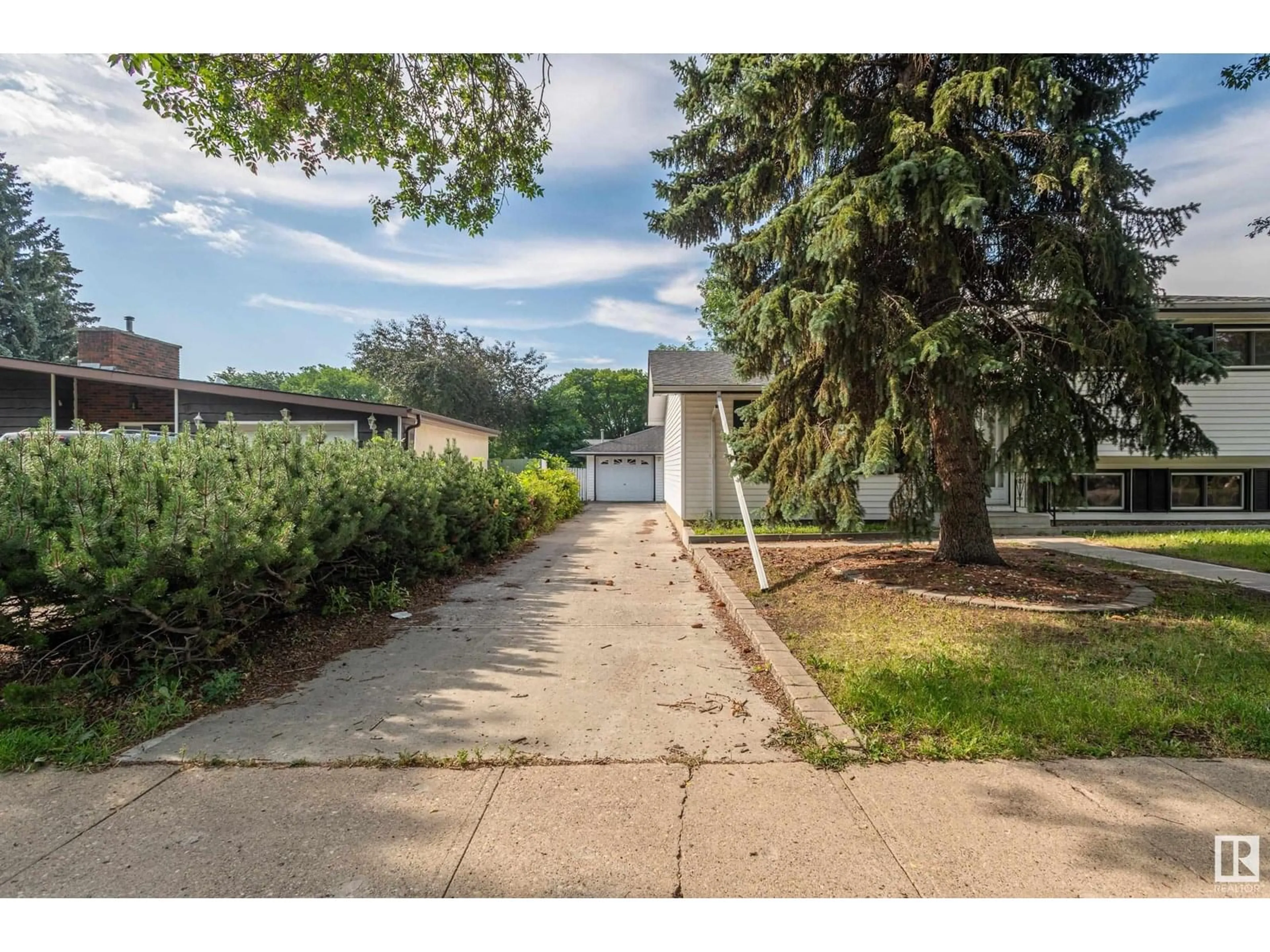 A pic from outside/outdoor area/front of a property/back of a property/a pic from drone, street for 6411 149 AV, Edmonton Alberta T5A1W1