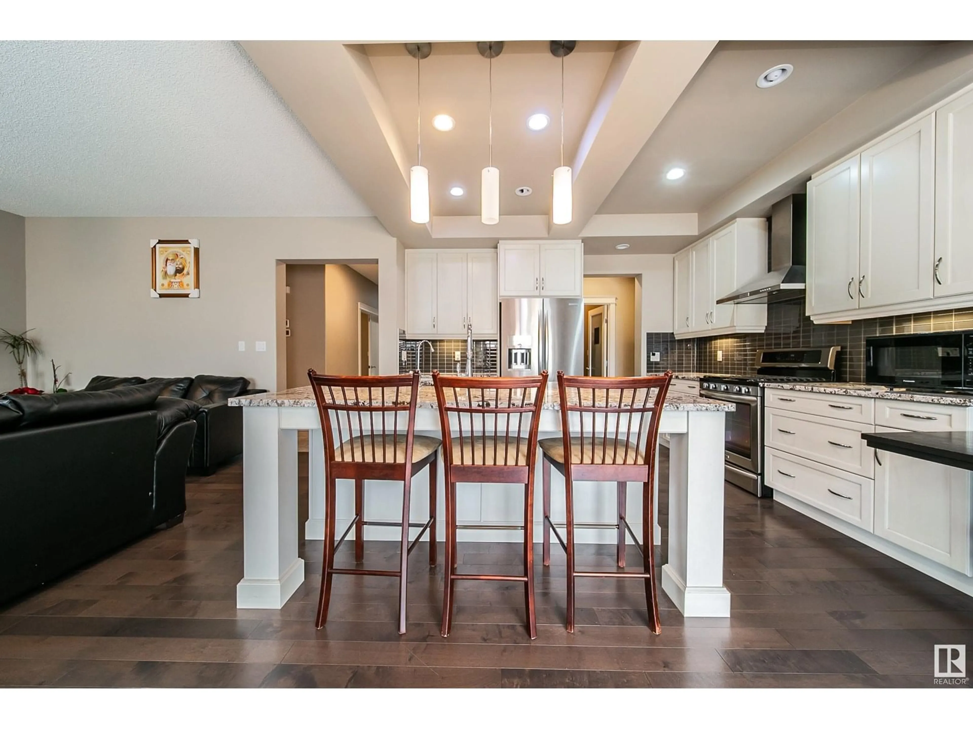 Open concept kitchen, wood/laminate floor for SW - 3203 WINSPEAR CR, Edmonton Alberta T6X1S7
