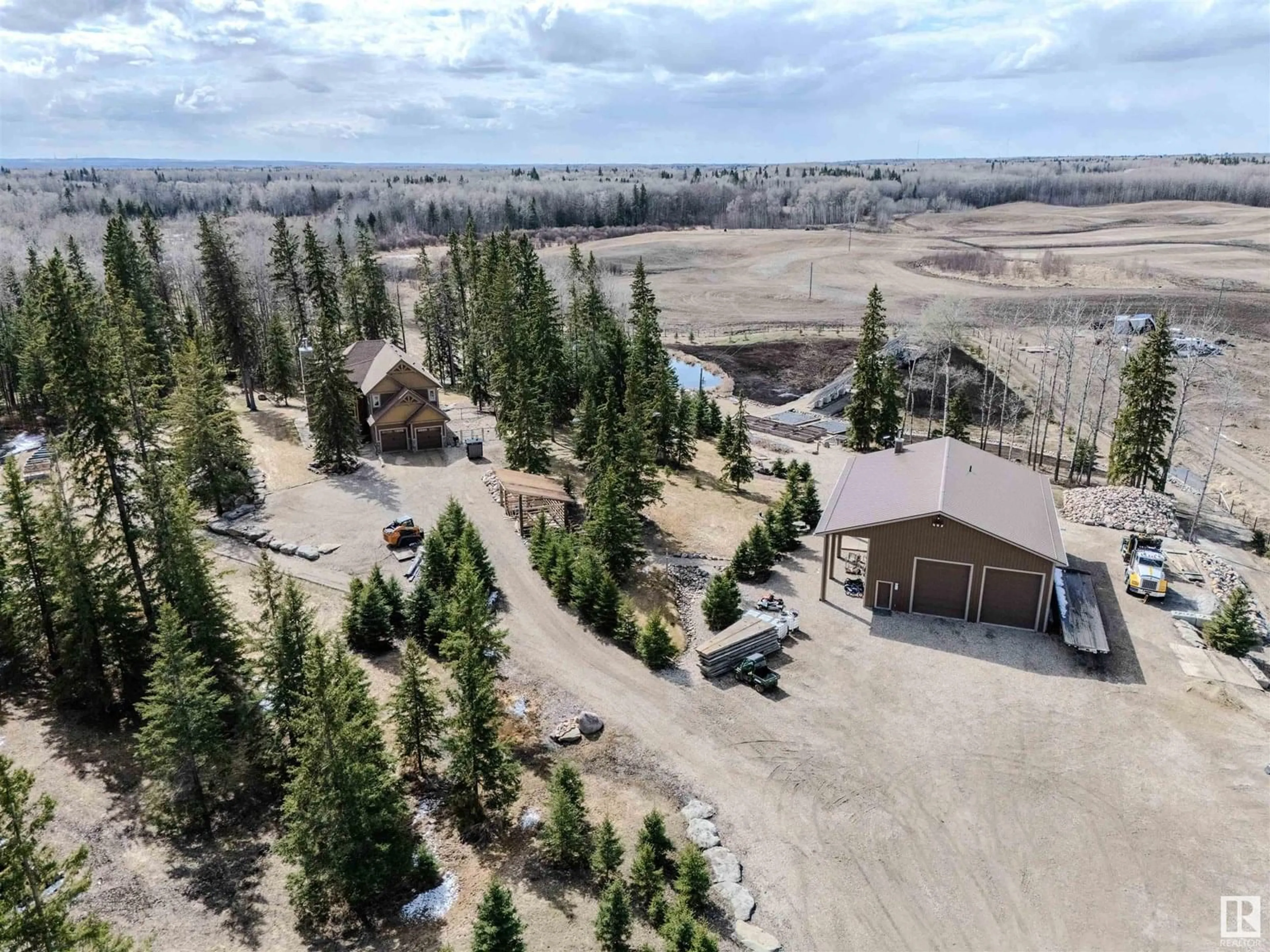A pic from outside/outdoor area/front of a property/back of a property/a pic from drone, unknown for 53226 RGE ROAD 24, Rural Parkland County Alberta T7Y0C9