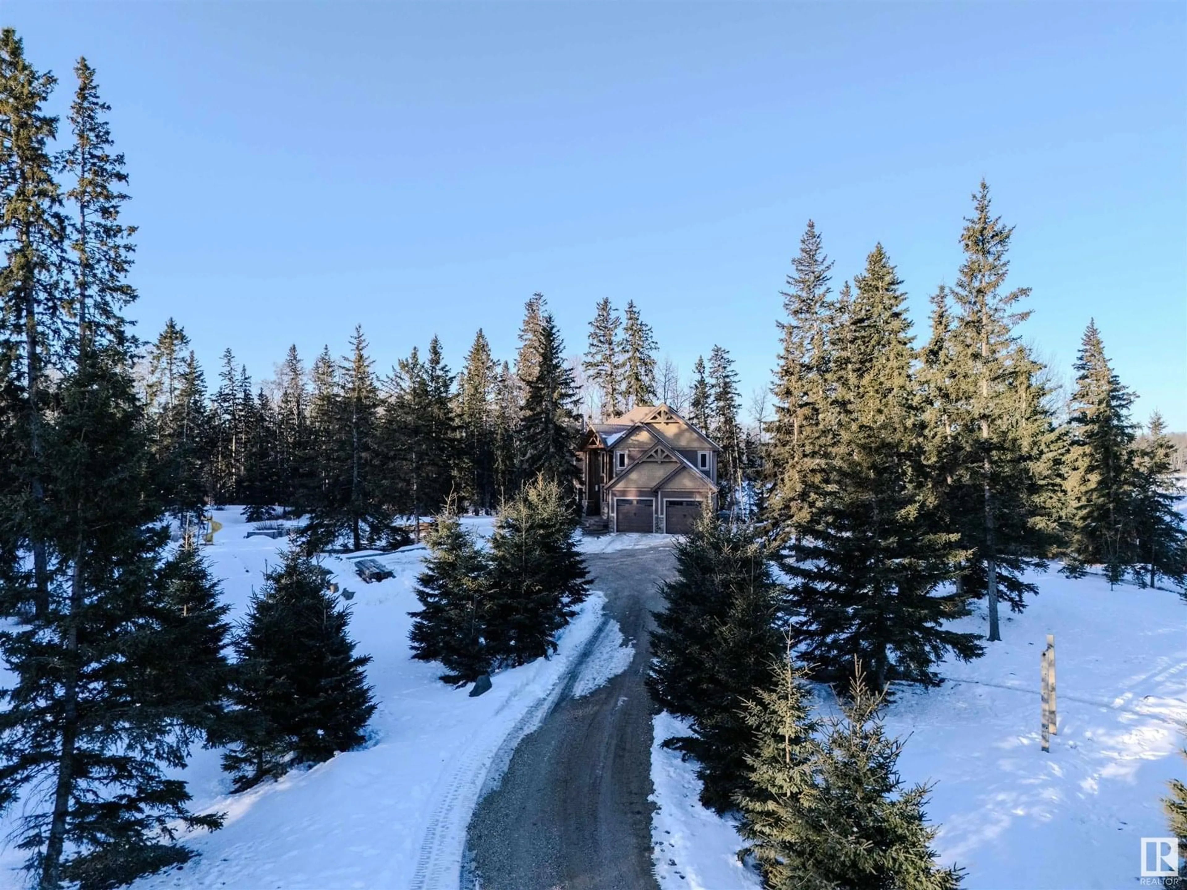 A pic from outside/outdoor area/front of a property/back of a property/a pic from drone, forest/trees view for 53226 RGE ROAD 24, Rural Parkland County Alberta T7Y0C9