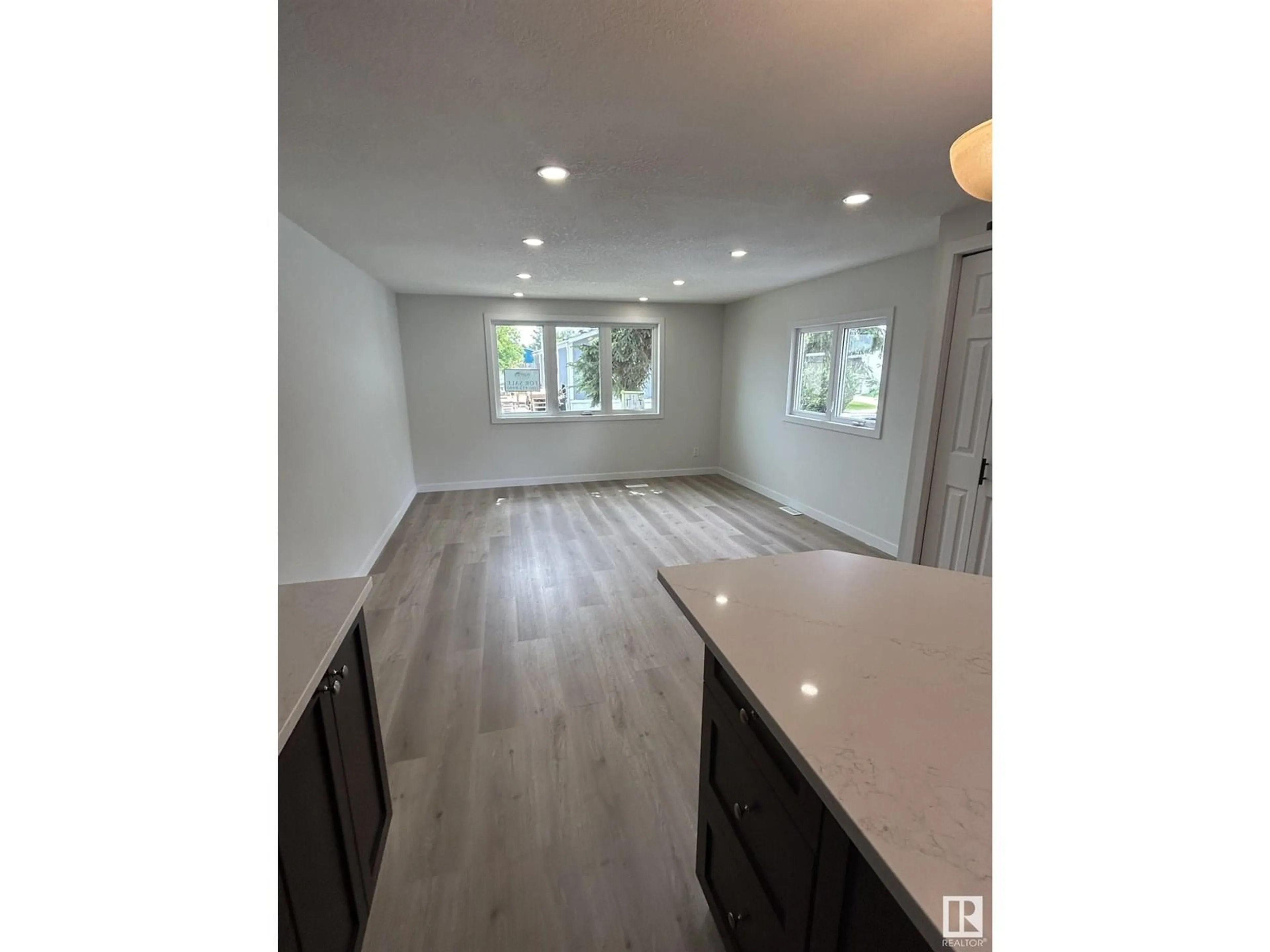 Open concept kitchen, wood/laminate floor for NW - 714 WEST RIDGE PL, Edmonton Alberta T5S1T5