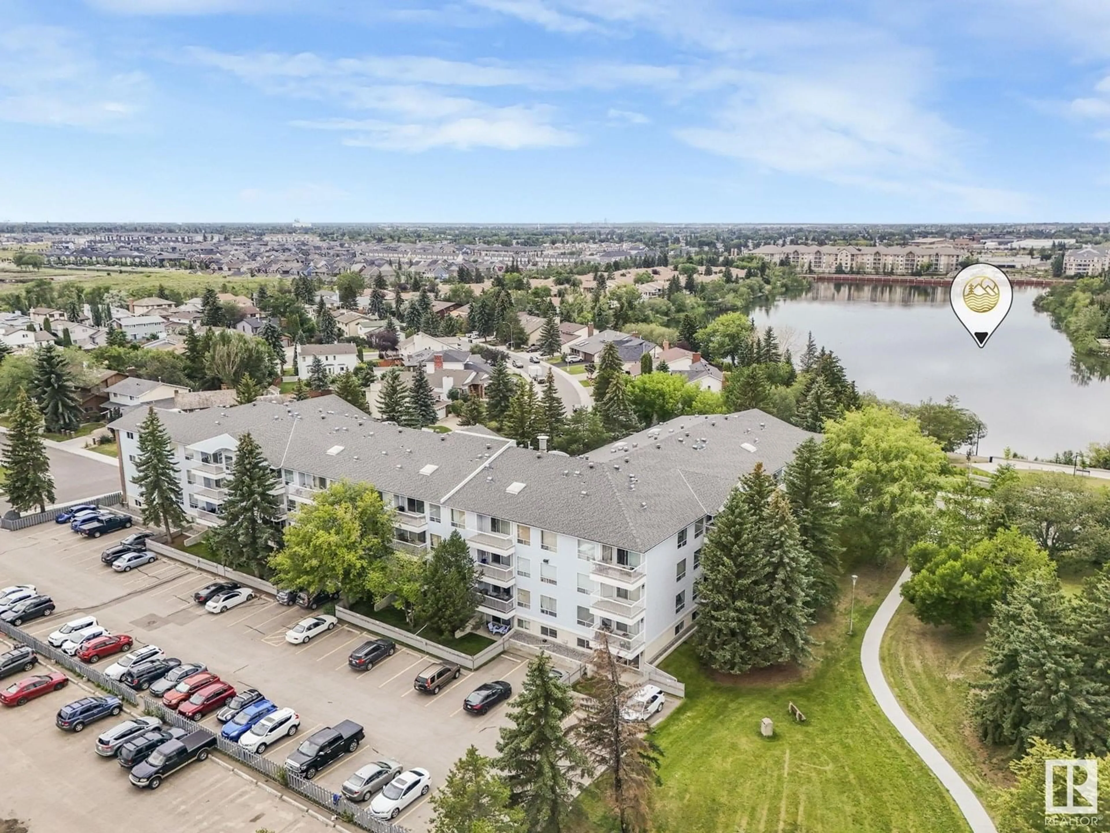 A pic from outside/outdoor area/front of a property/back of a property/a pic from drone, water/lake/river/ocean view for #116 - 15503 106 ST NW, Edmonton Alberta T5X5W7