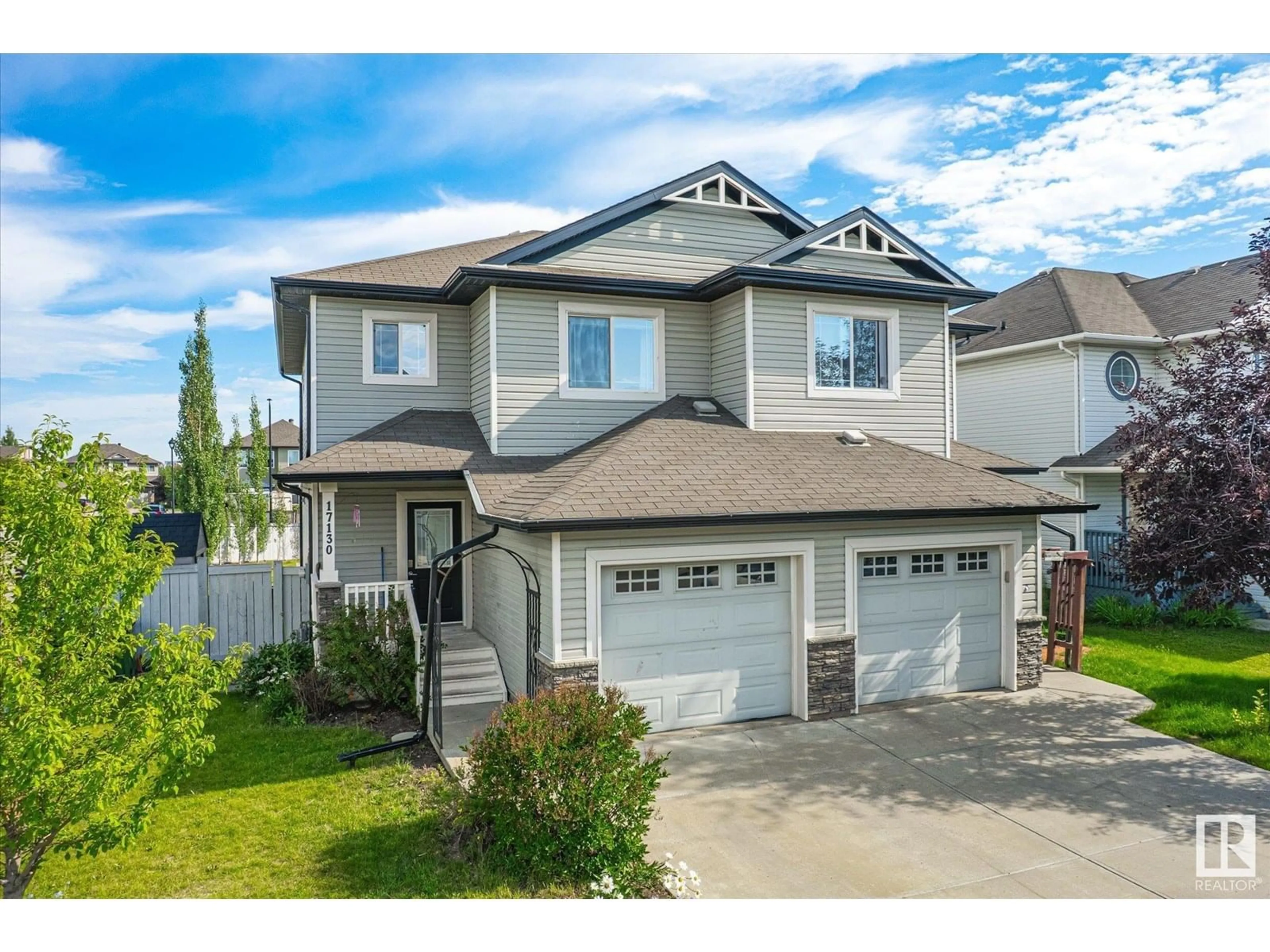 Home with vinyl exterior material, street for 17130 7A AV, Edmonton Alberta T6W0M5