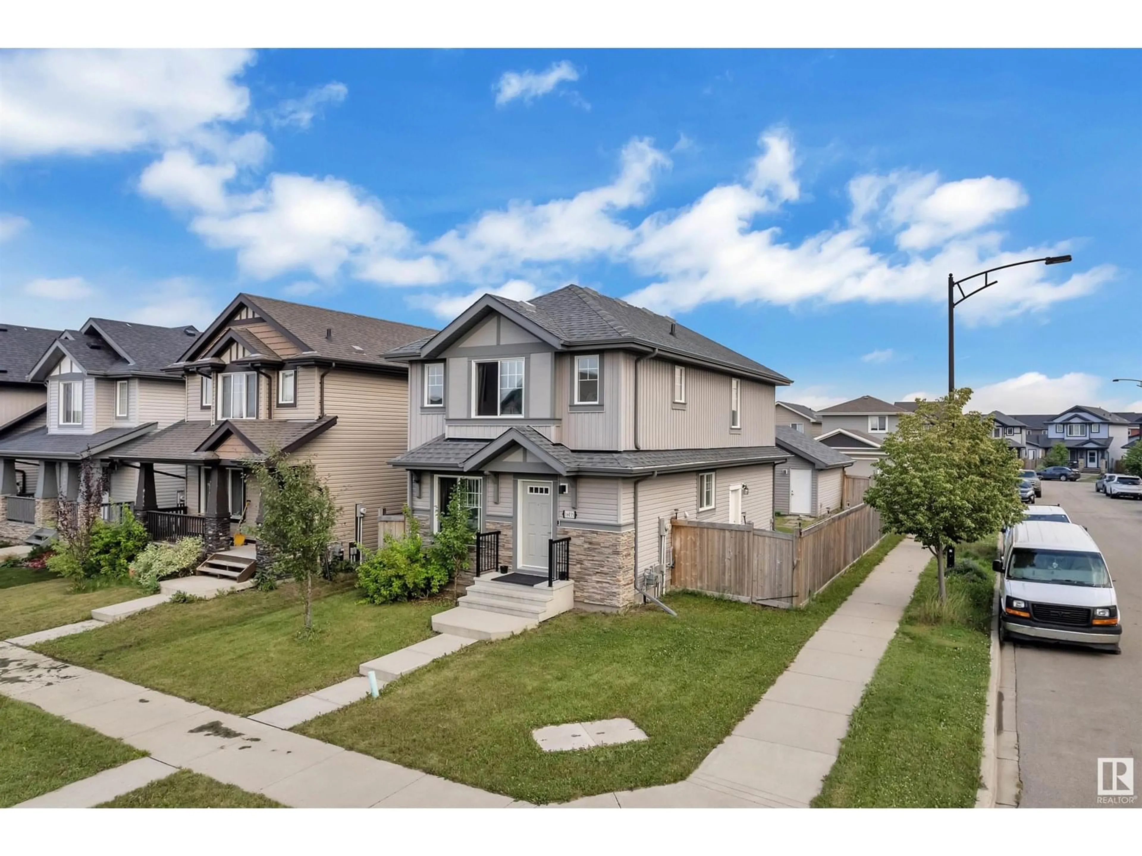 A pic from outside/outdoor area/front of a property/back of a property/a pic from drone, street for 16035 12 AV, Edmonton Alberta T6W2W6