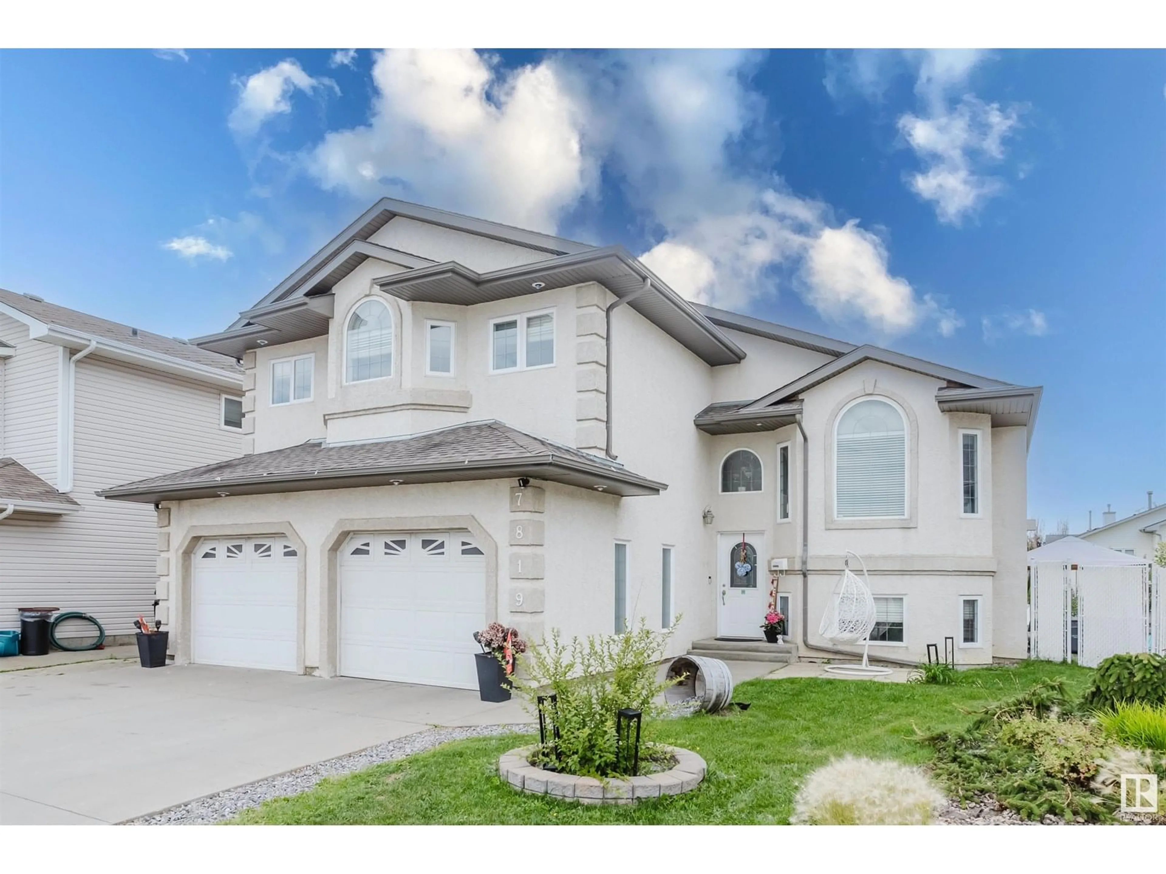 Home with vinyl exterior material, street for 7819 166 AV, Edmonton Alberta T5Z3V8