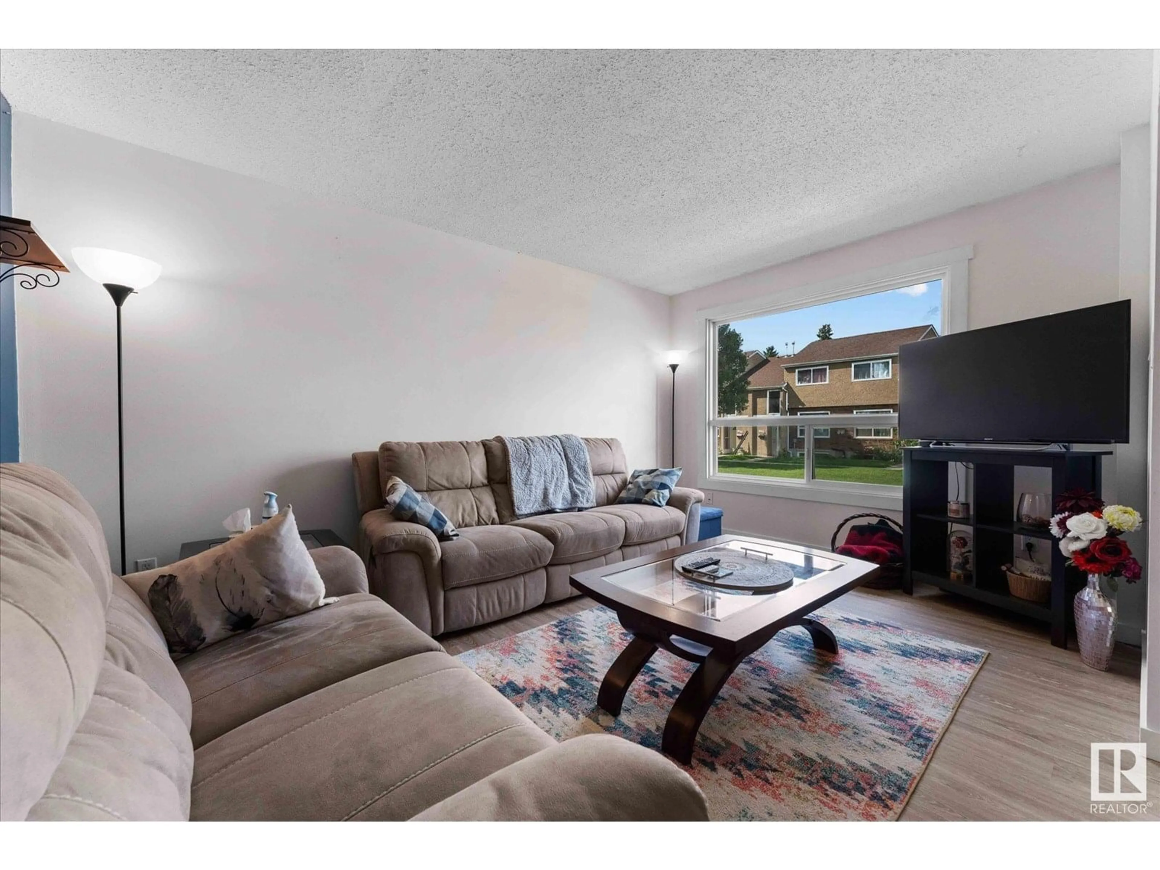 Living room with furniture, unknown for 18262 91 AV, Edmonton Alberta T5T1T6