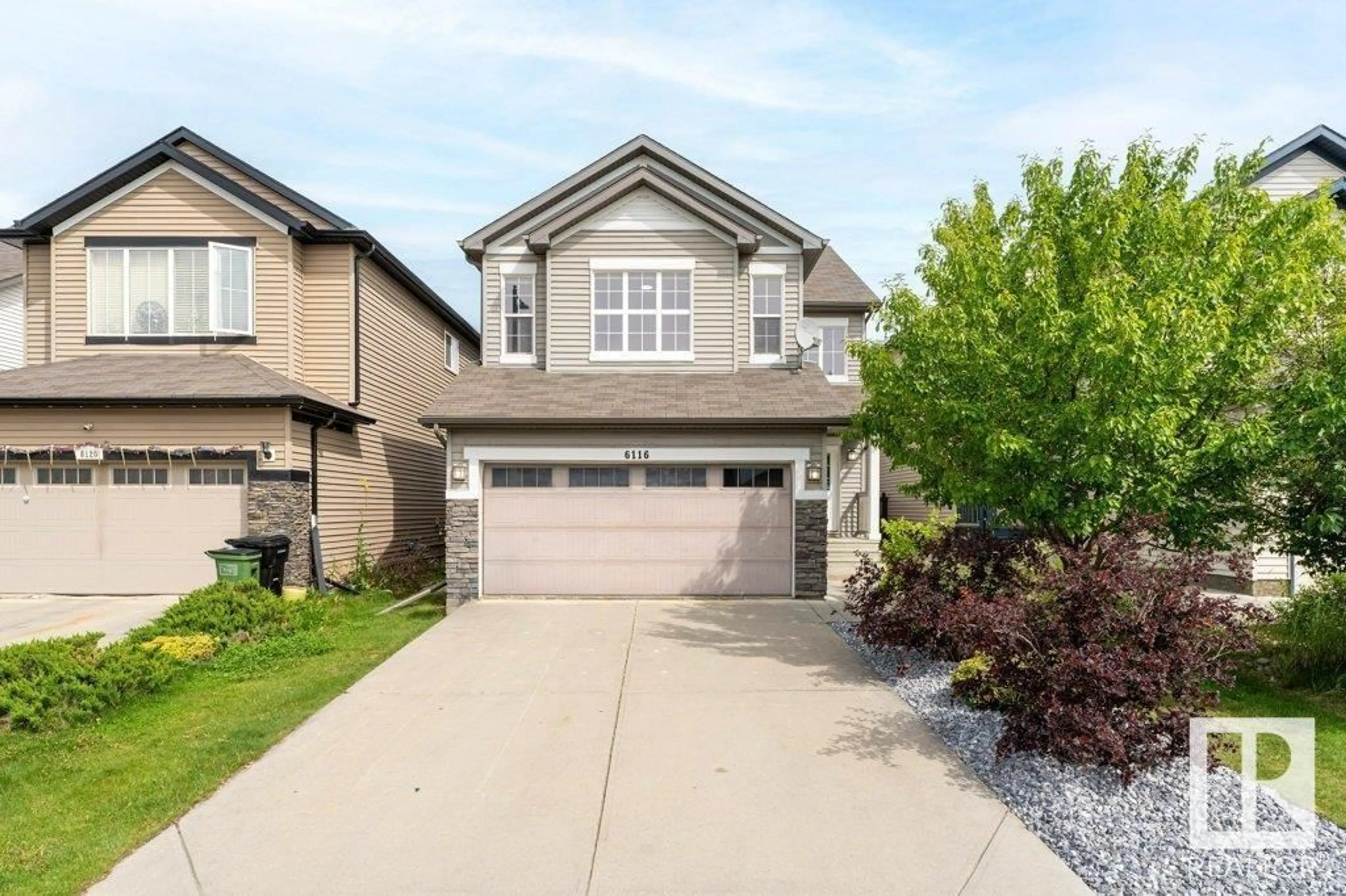 Home with vinyl exterior material, street for 6116 10 AV, Edmonton Alberta T6X0M3
