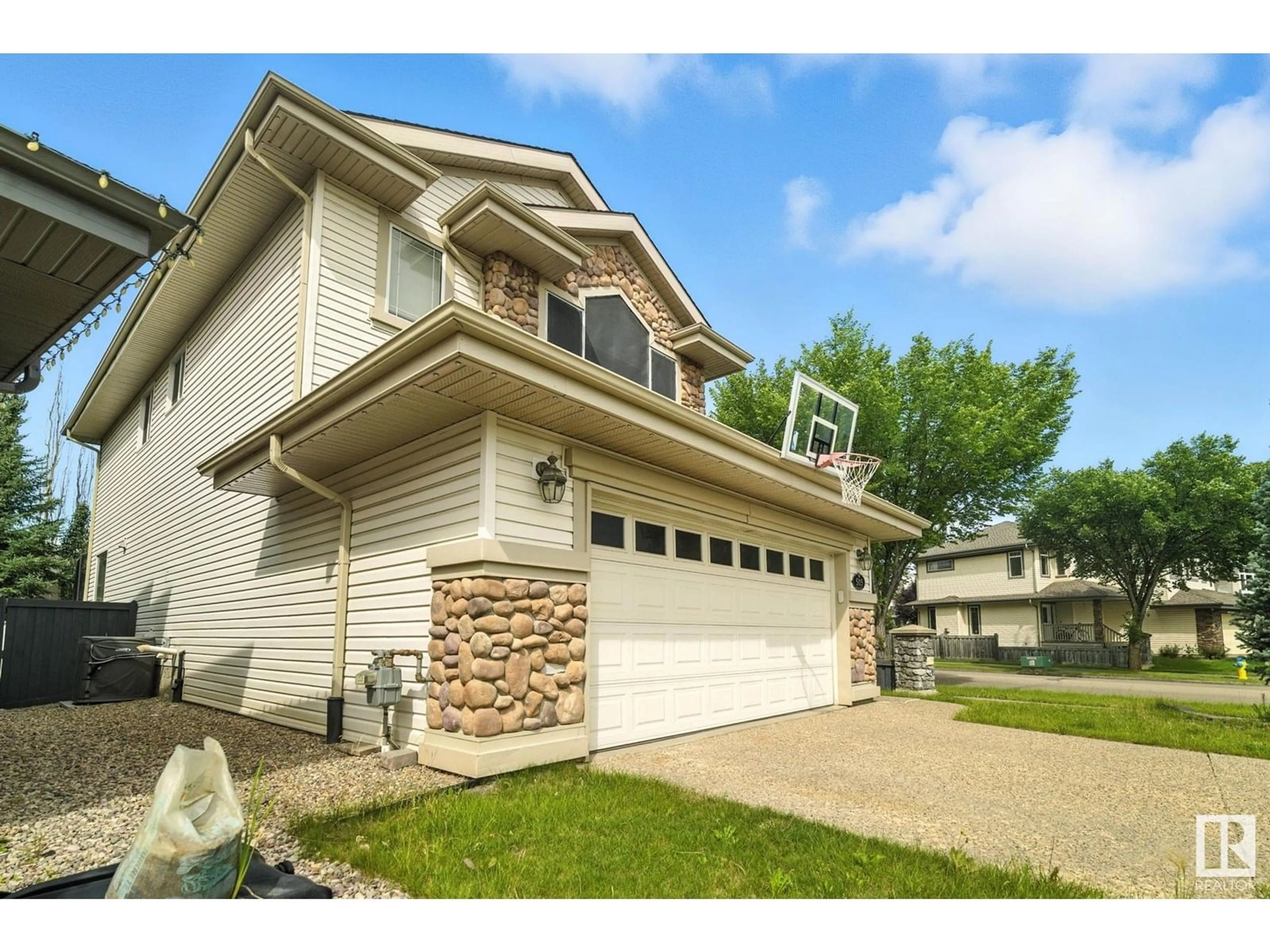 Home with vinyl exterior material, street for 5115 TERWILLEGAR BV, Edmonton Alberta T6R3P1