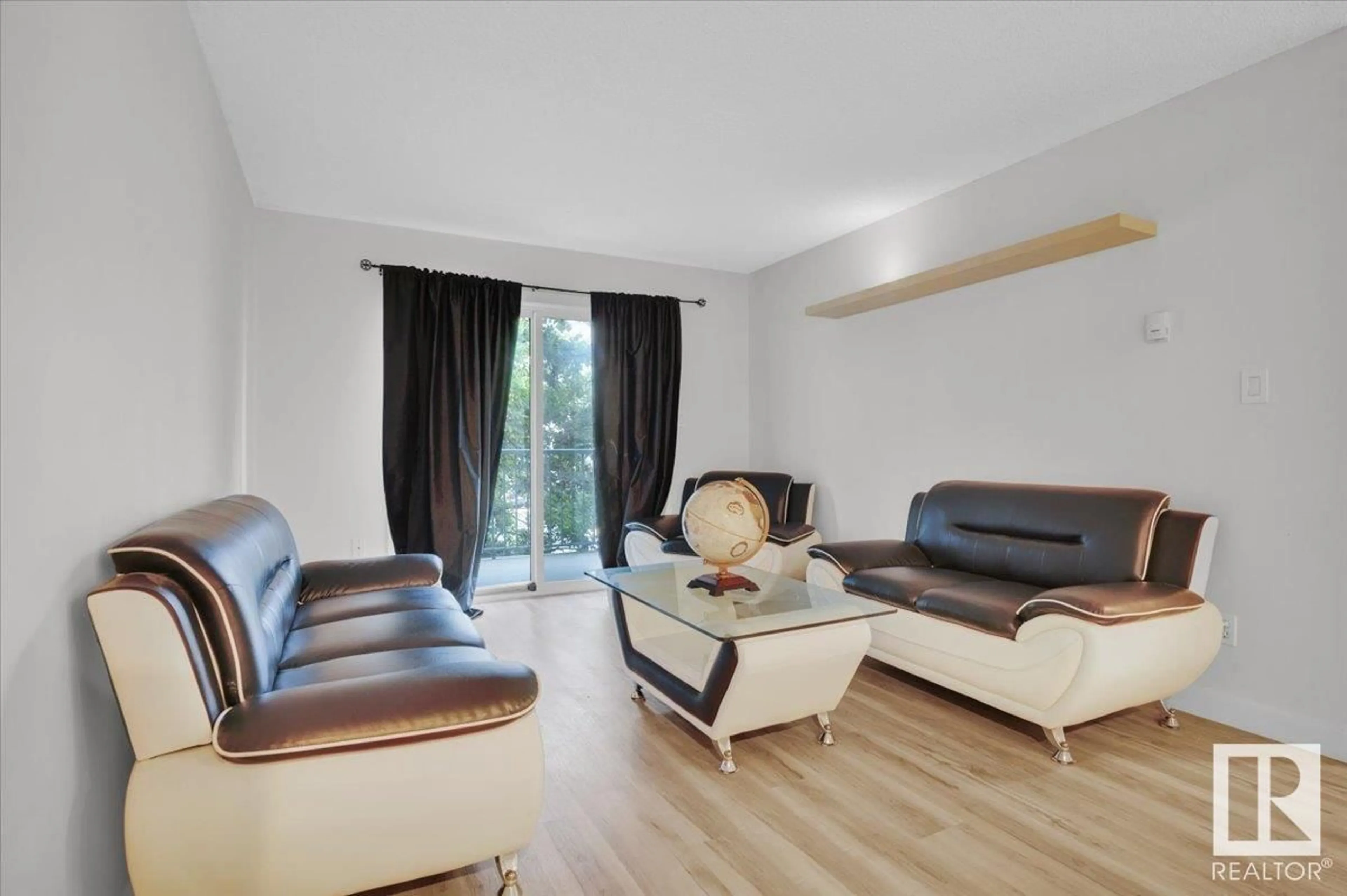 Living room with furniture, wood/laminate floor for #231 - 2520 50 ST, Edmonton Alberta T6L7A8