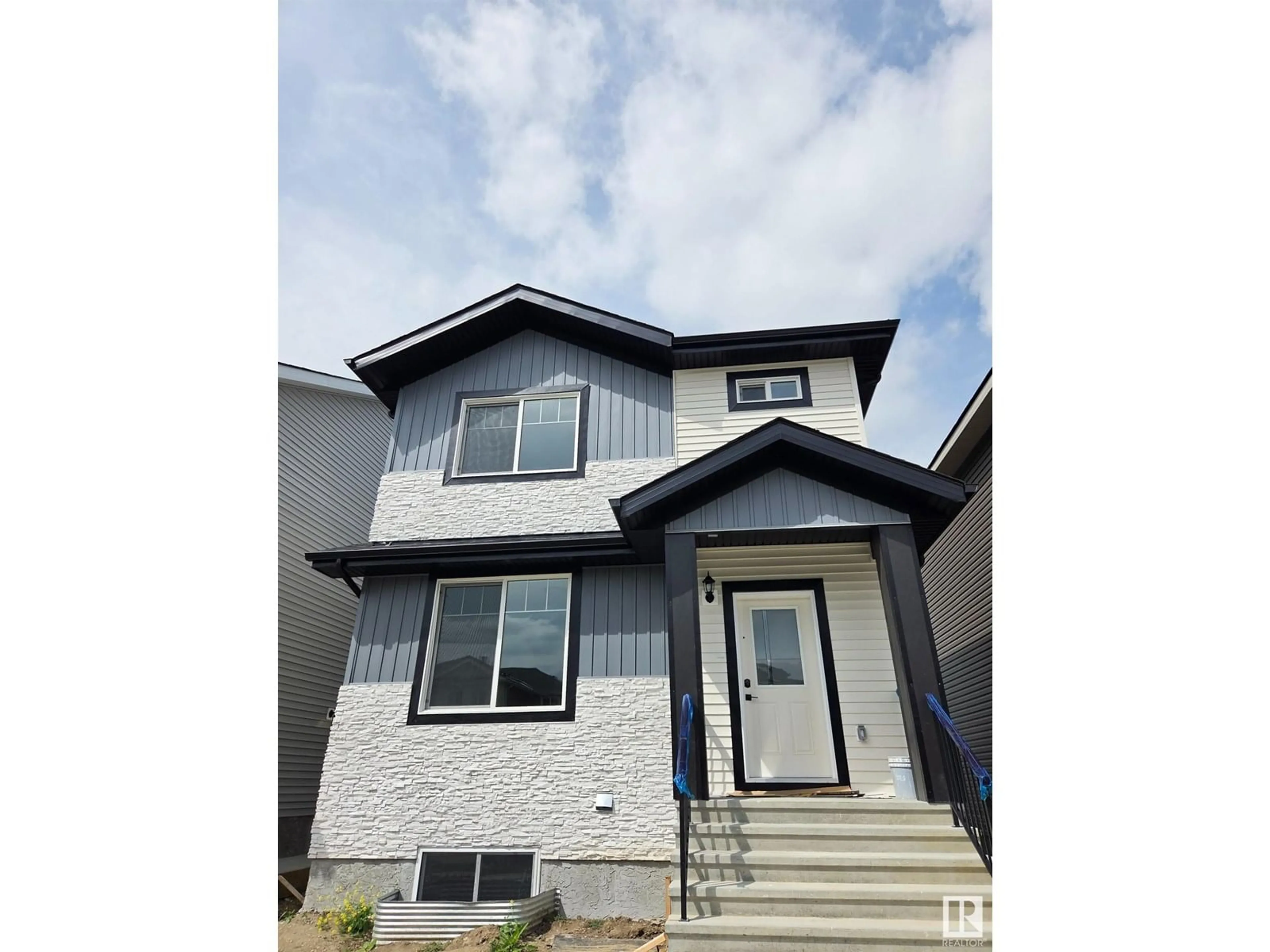 Home with vinyl exterior material, street for 54 WYATT RDGE, Fort Saskatchewan Alberta T8L3L7