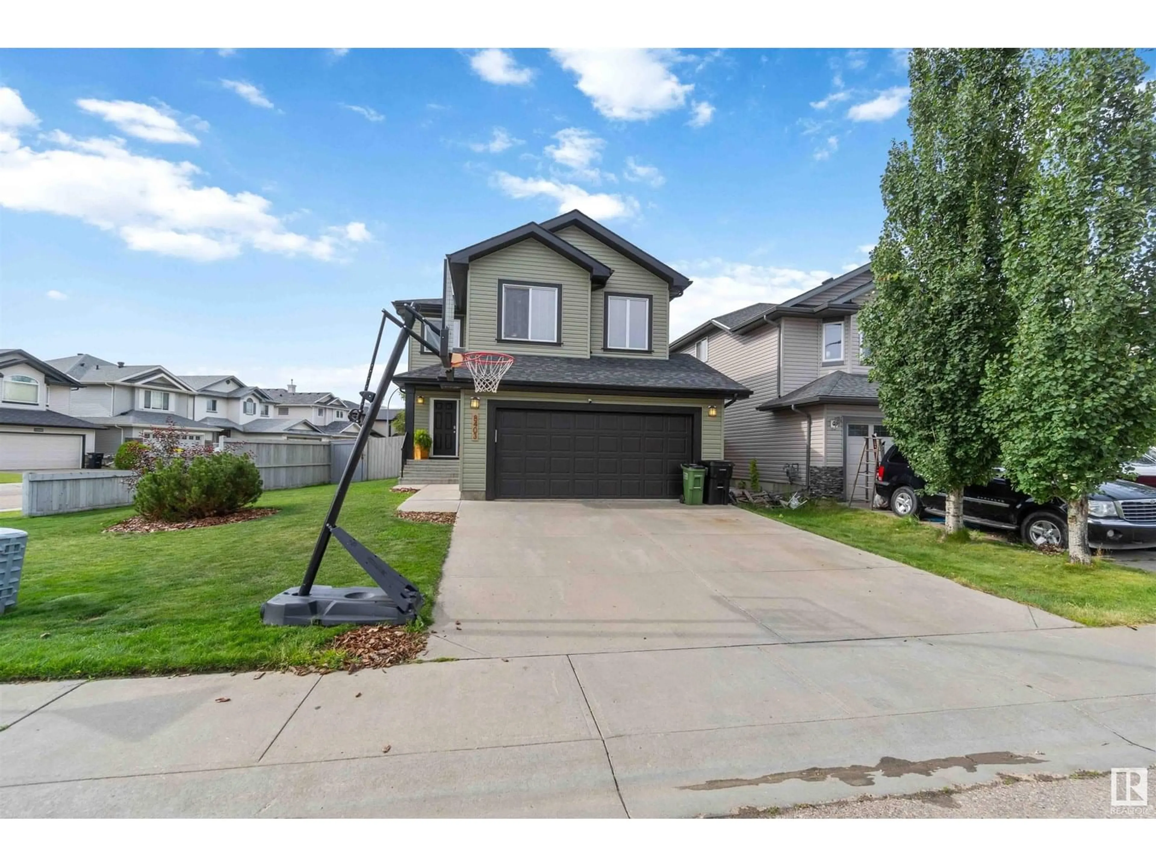A pic from outside/outdoor area/front of a property/back of a property/a pic from drone, street for 8403 179 AV, Edmonton Alberta T5Z0C3