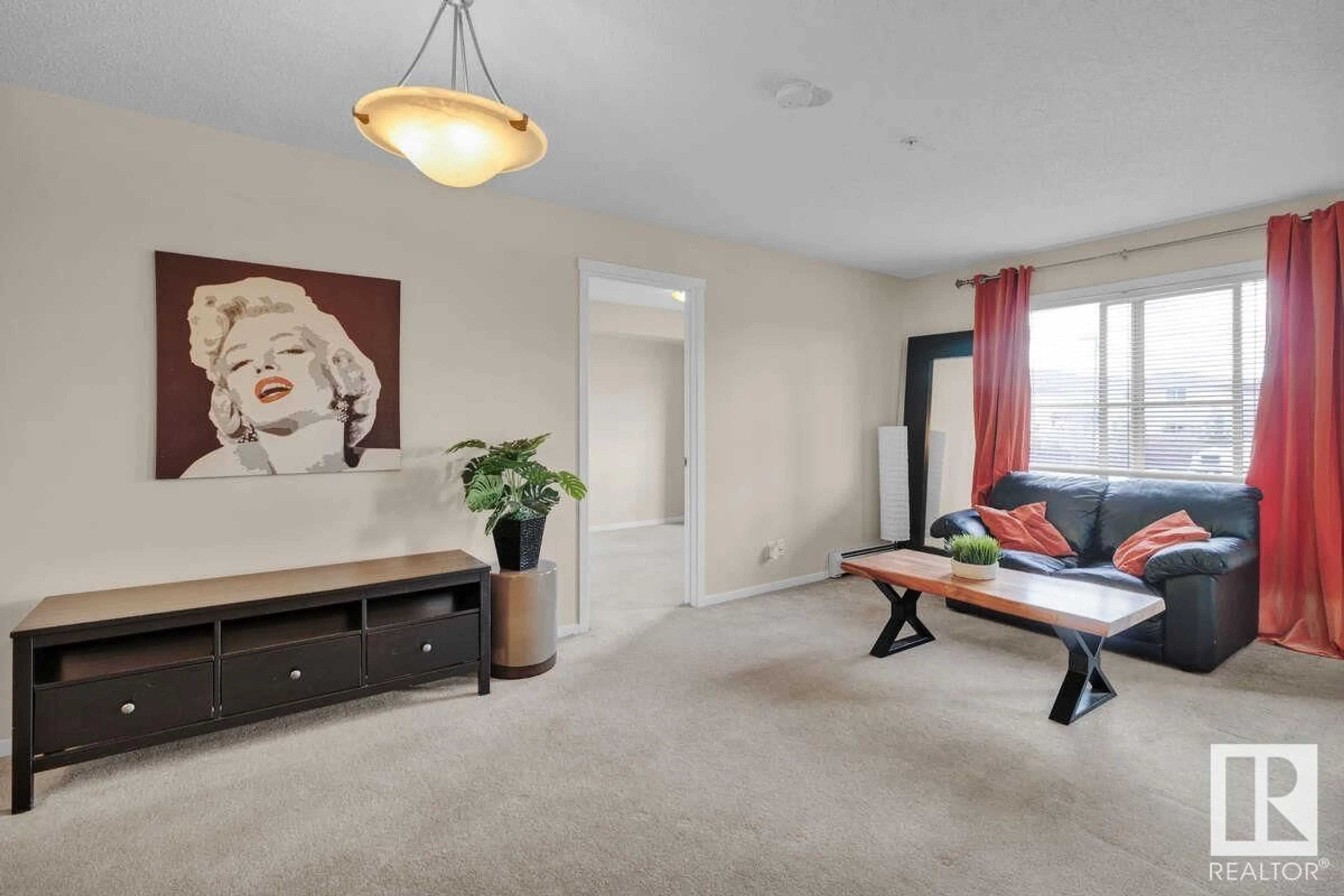 Living room with furniture, carpet floor for #206 - 5370 CHAPPELLE RD, Edmonton Alberta T6W3L5
