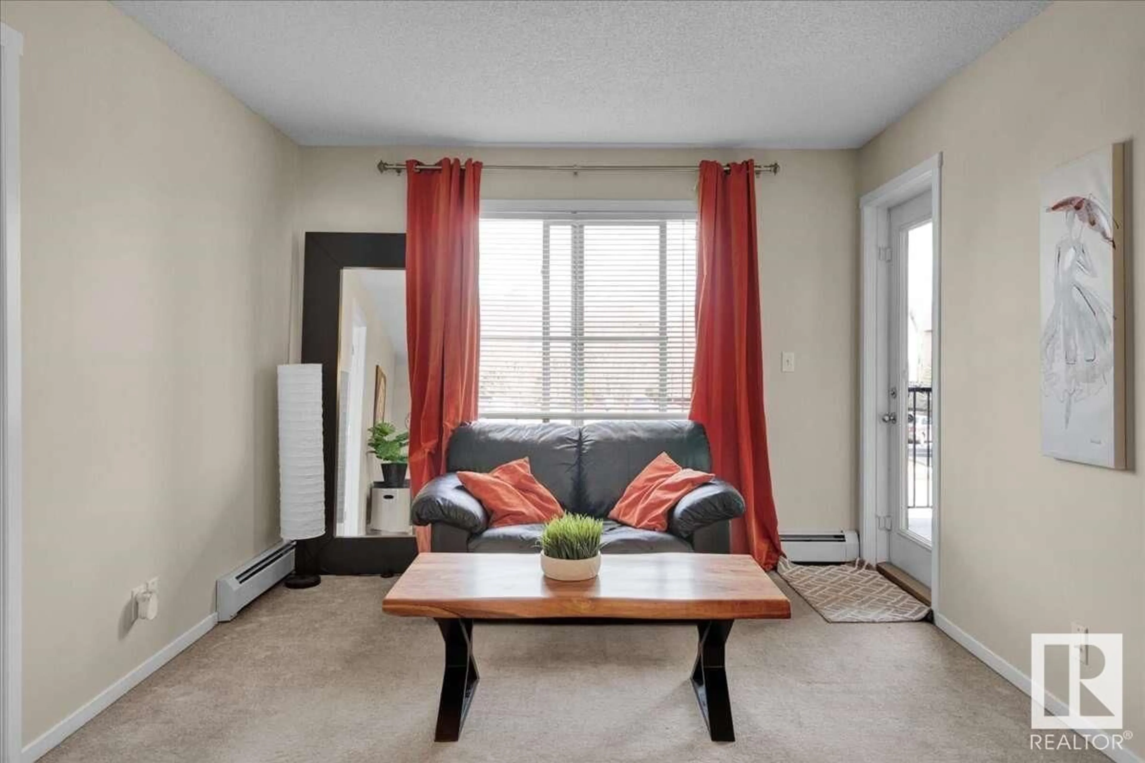 Living room with furniture, carpet floor for #206 - 5370 CHAPPELLE RD, Edmonton Alberta T6W3L5